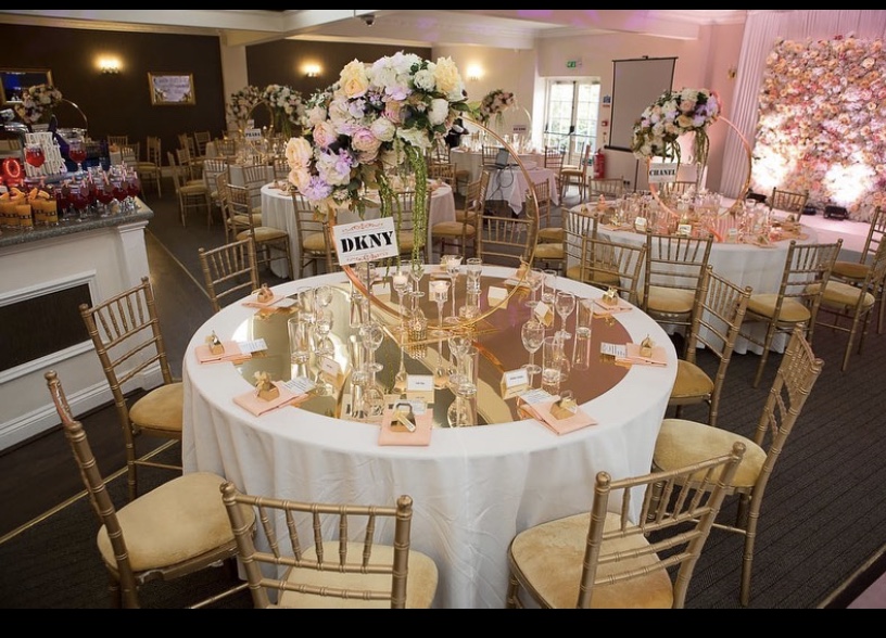 Elegant banquet hall with floral centerpieces for upscale events at Best Western Thurrock Hotel.