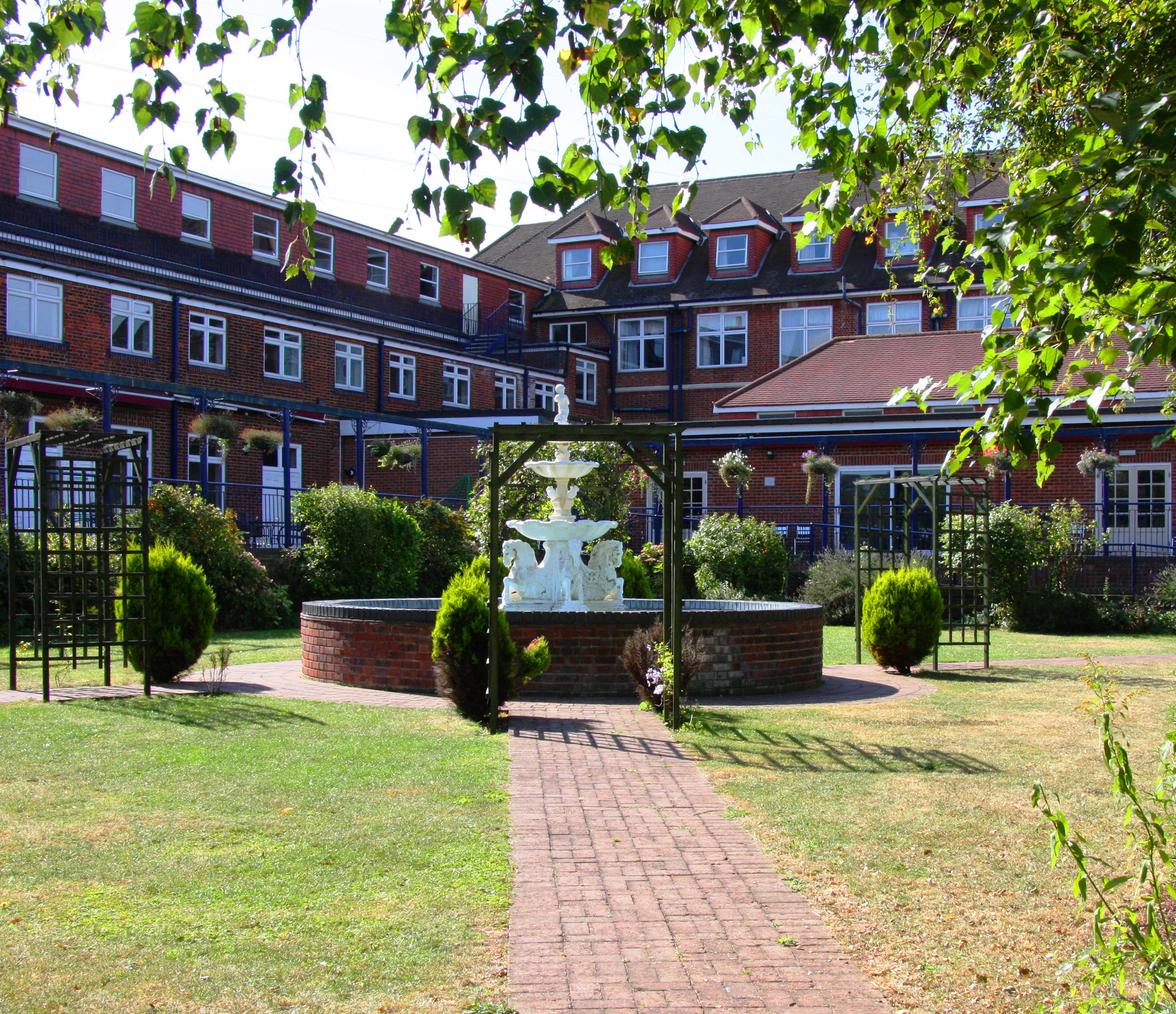 Garden Suite at Best Western Thurrock Hotel with fountain, ideal for outdoor receptions.