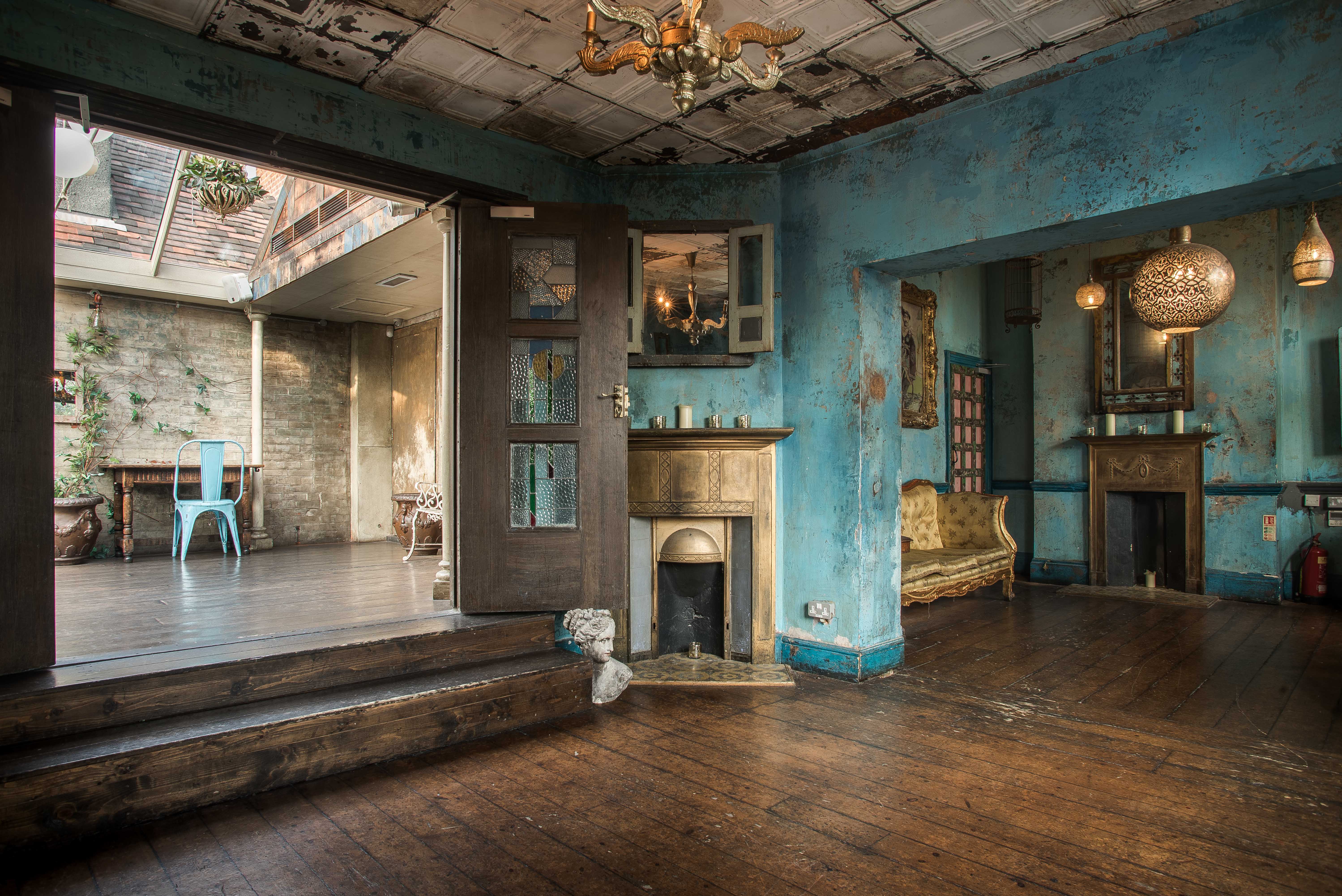 Private dining room with exposed brick, ideal for intimate gatherings and creative events.