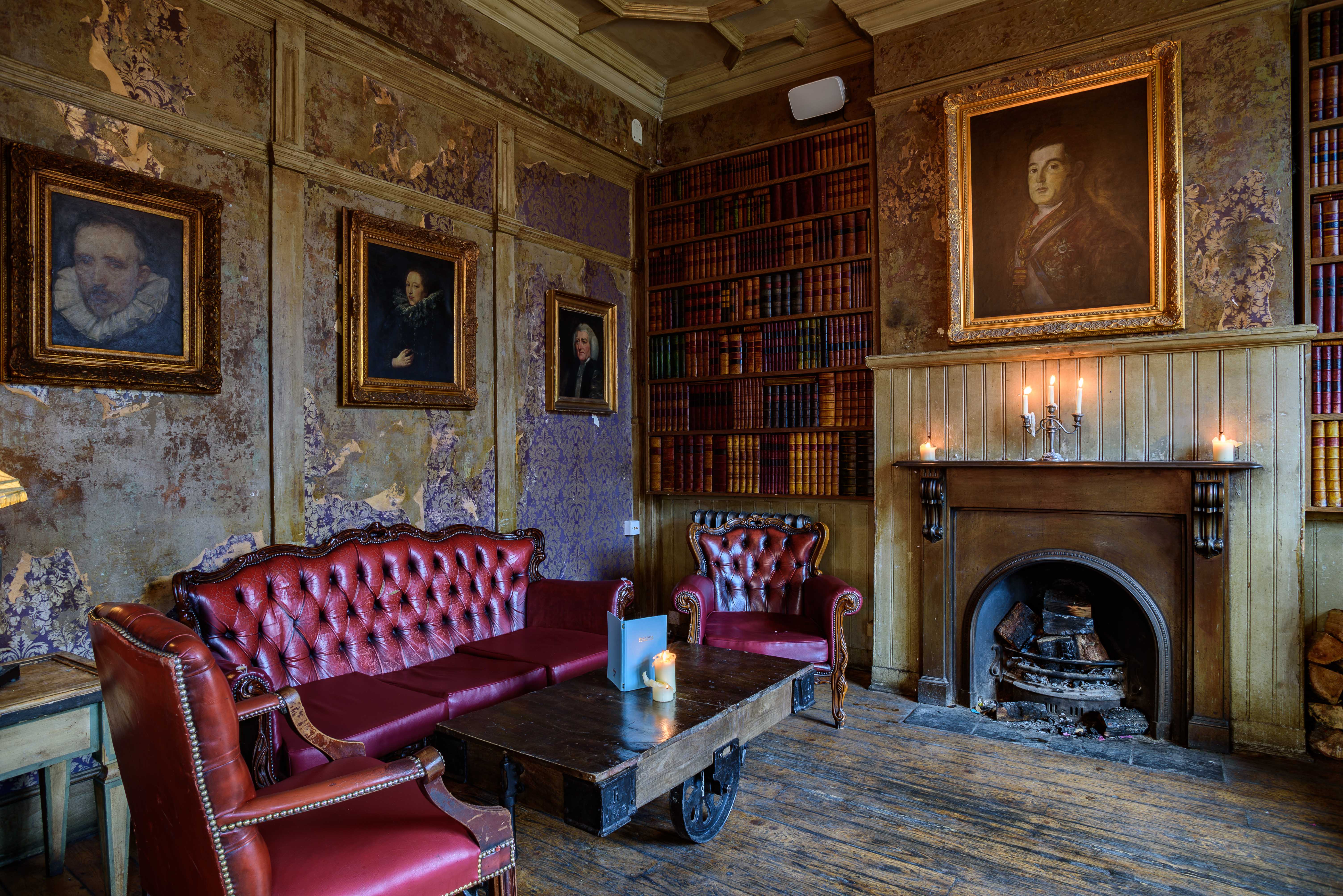 Vintage meeting space with dark wood paneling, ideal for intimate gatherings and executive meetings.