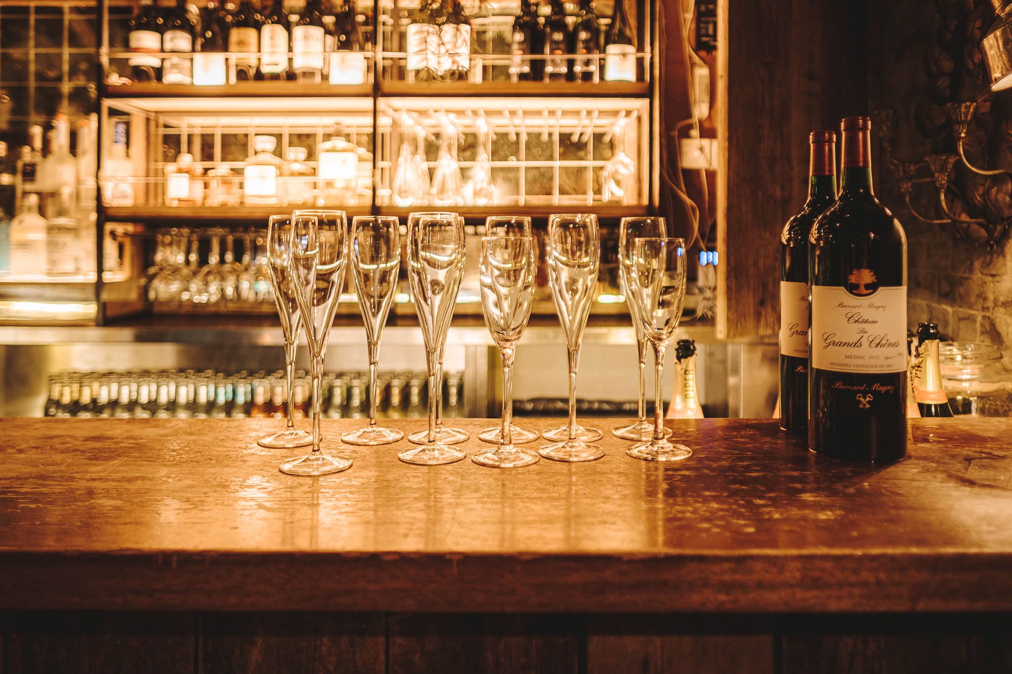 Stylish bar with champagne flutes for celebratory events and networking receptions.