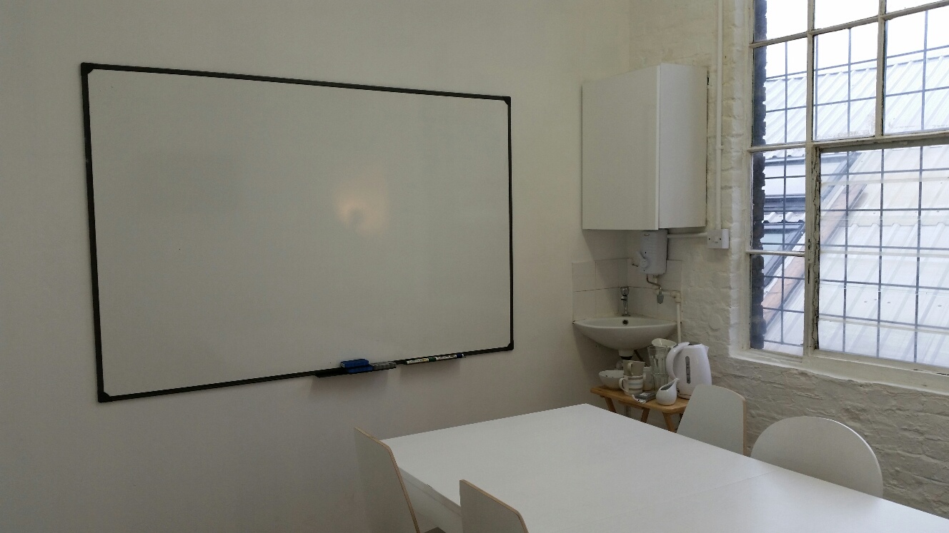Minimalist meeting space at Clapham North Art Centre, perfect for workshops and brainstorming.