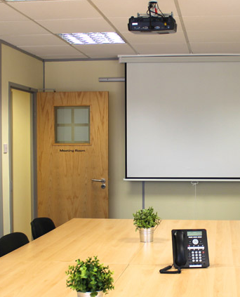 Board Room at Devonshire House: minimalist meeting space for professional gatherings.