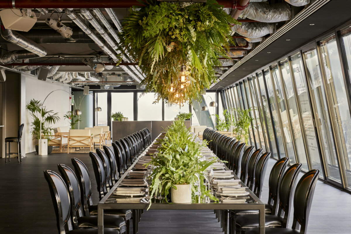 Whole Venue at Landing 42: elegant dining table, modern event space for corporate functions.