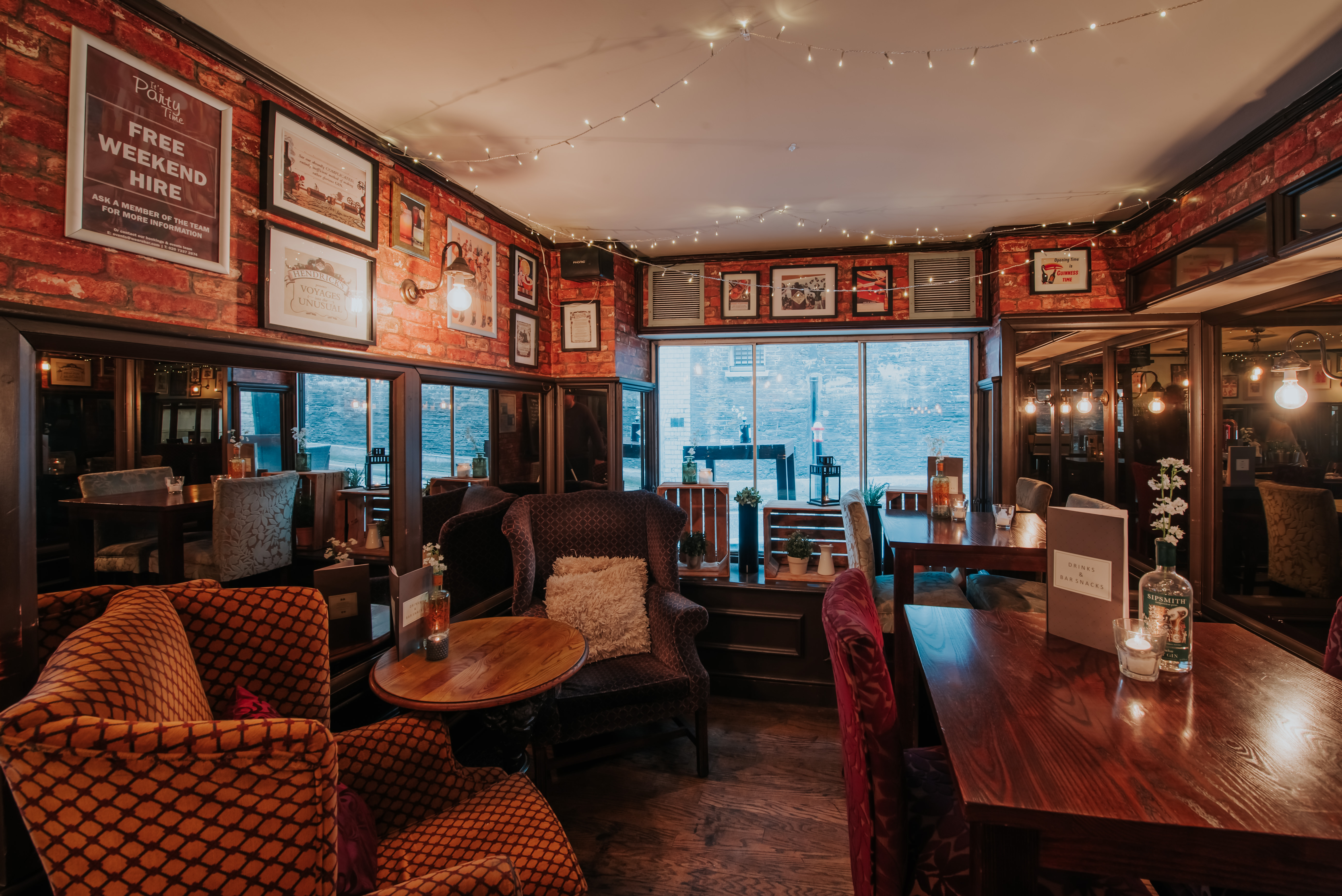 Cozy venue with warm lighting, ideal for intimate gatherings and small events.