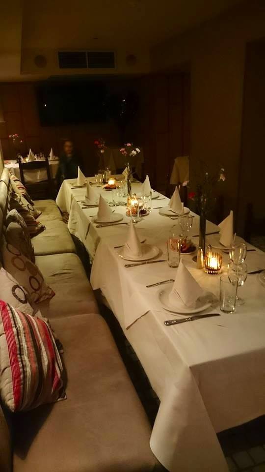 Elegant dining table in Retsina Private Room for formal dinners and intimate gatherings.