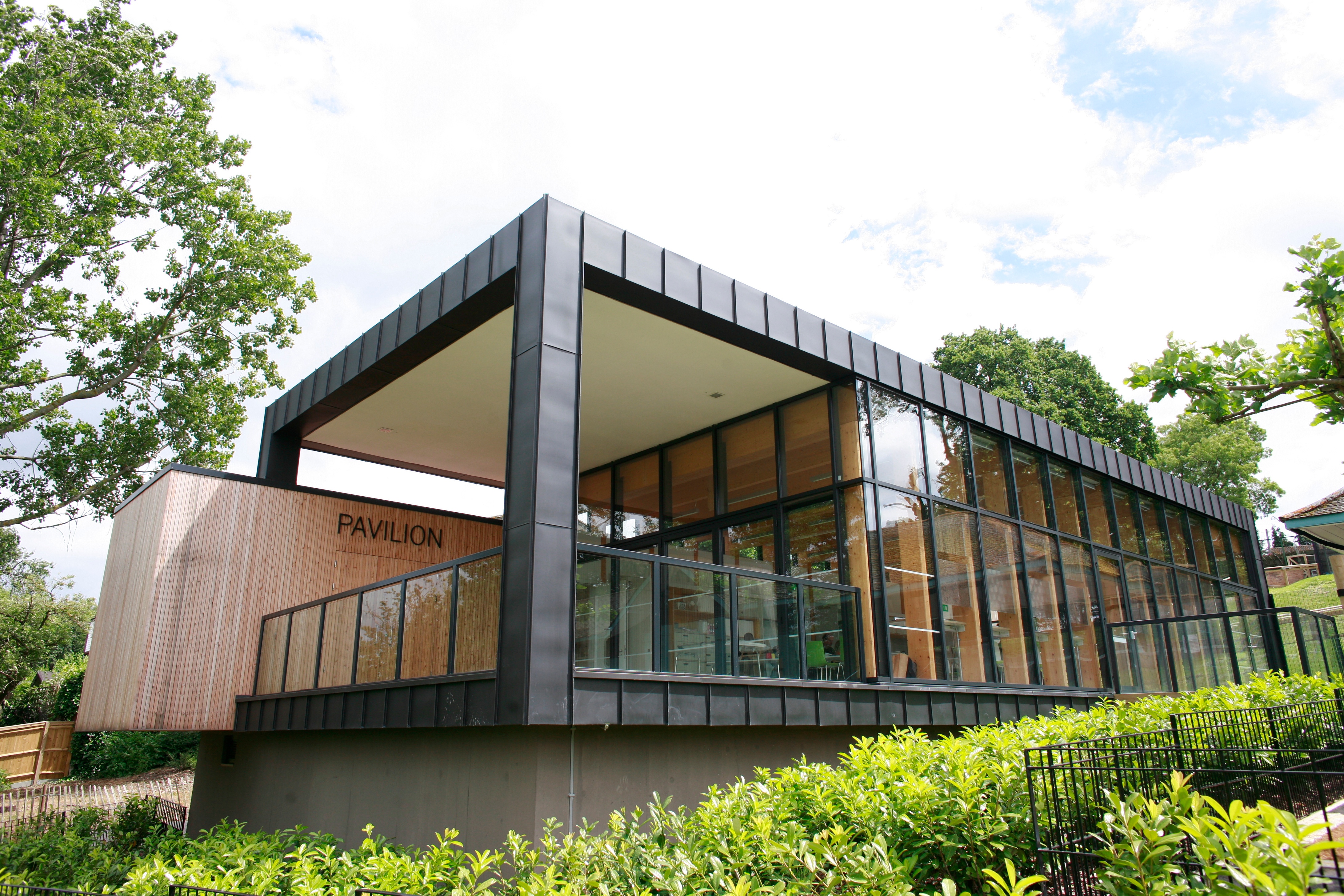 Modern pavilion at Horniman Museum, featuring large glass windows for events.
