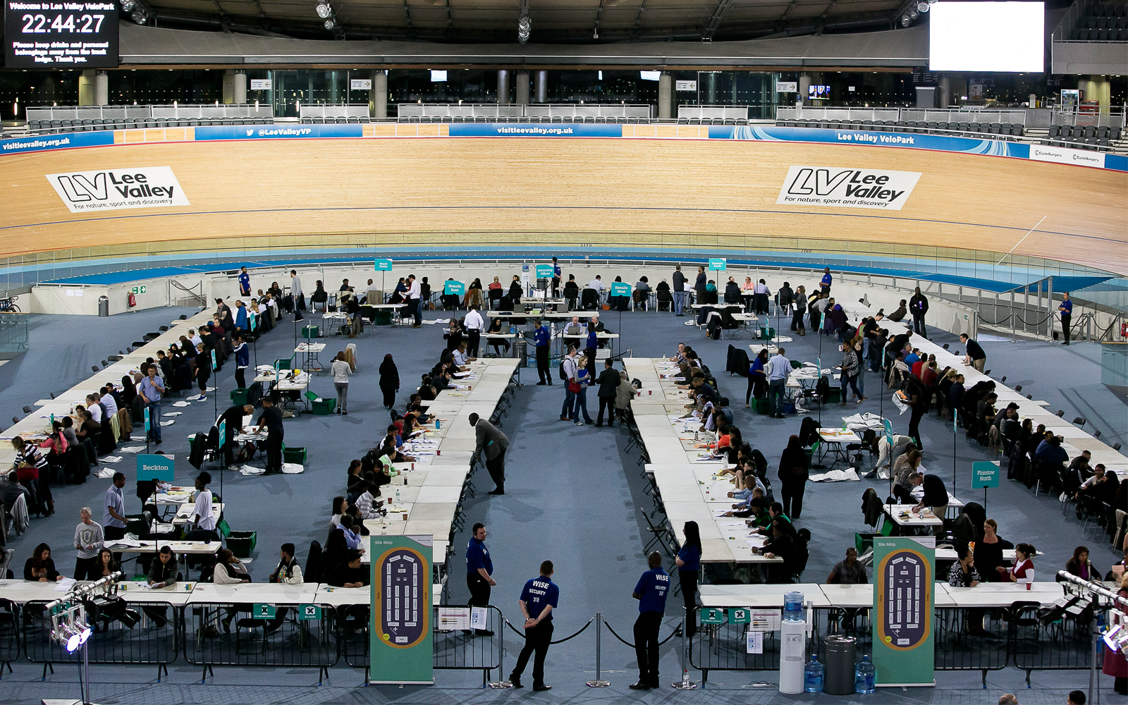 Velodrome Track Centre event setup with tables for networking and registration.