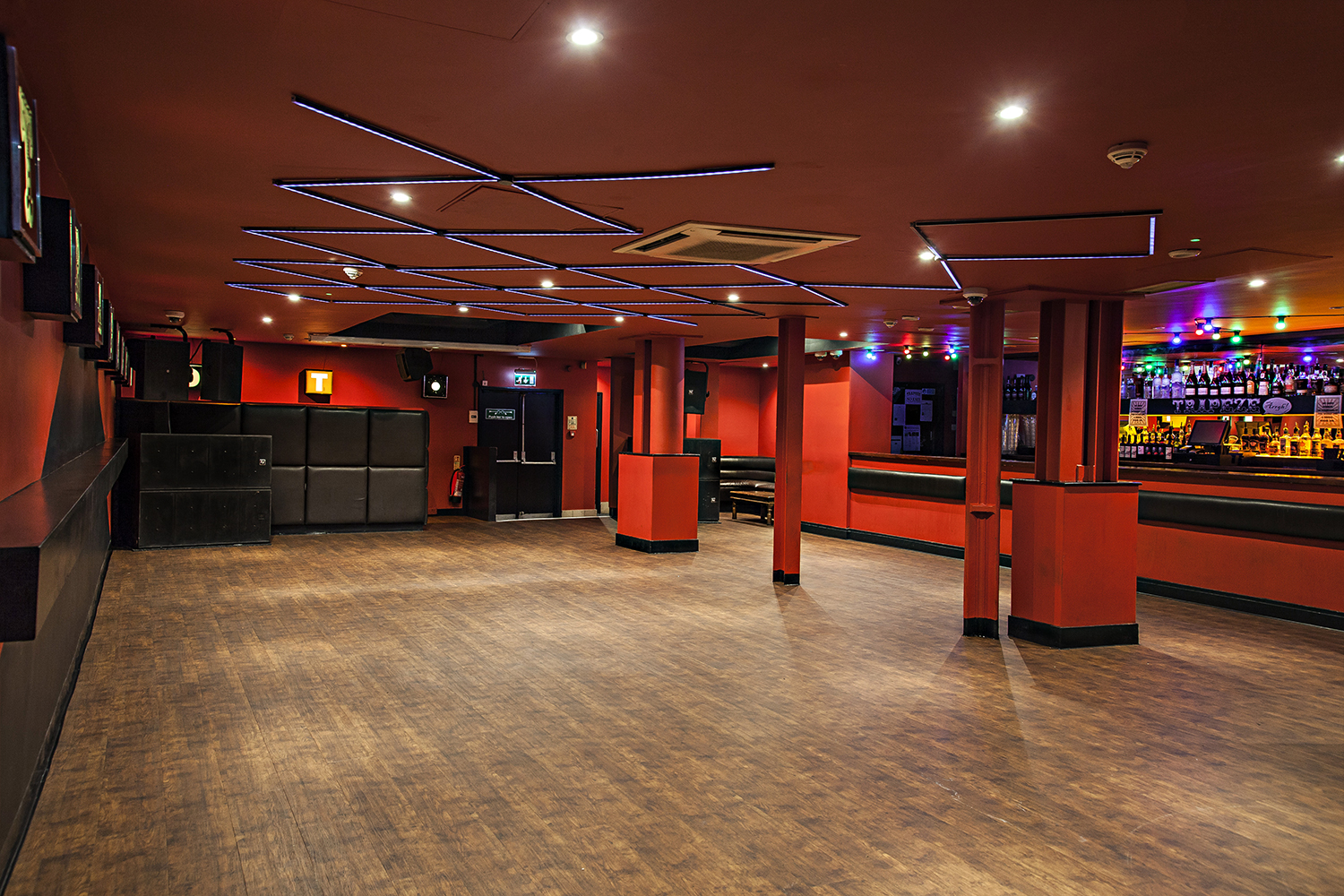 Modern event space at The Basement Club with vibrant lighting for parties and gatherings.