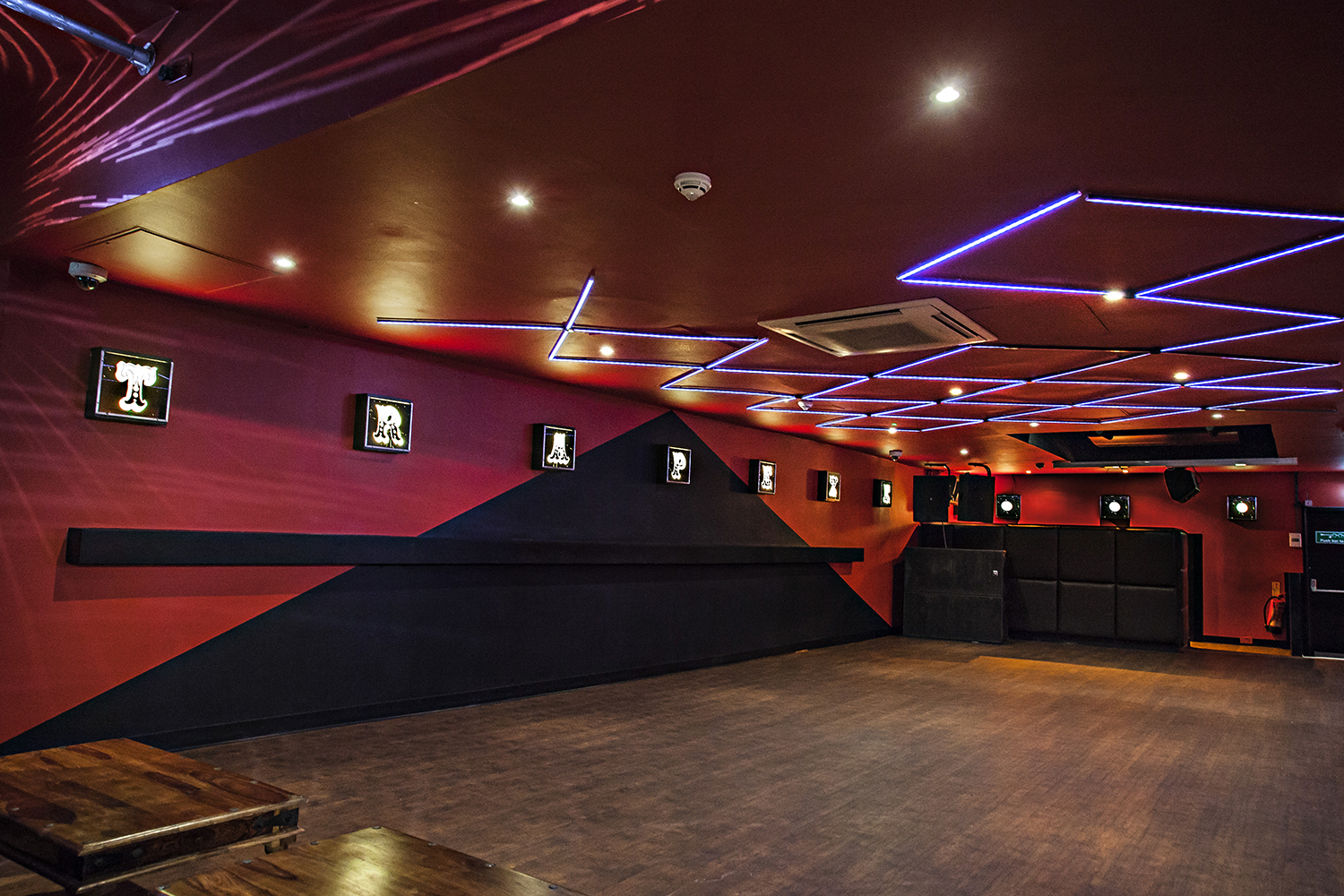 Modern event space at The Basement Club, featuring dynamic lighting for gatherings.