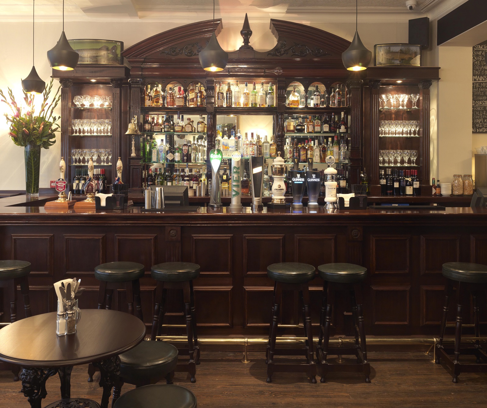 Whole Venue bar at The Hat & Tun, polished wood counter, ideal for networking events.