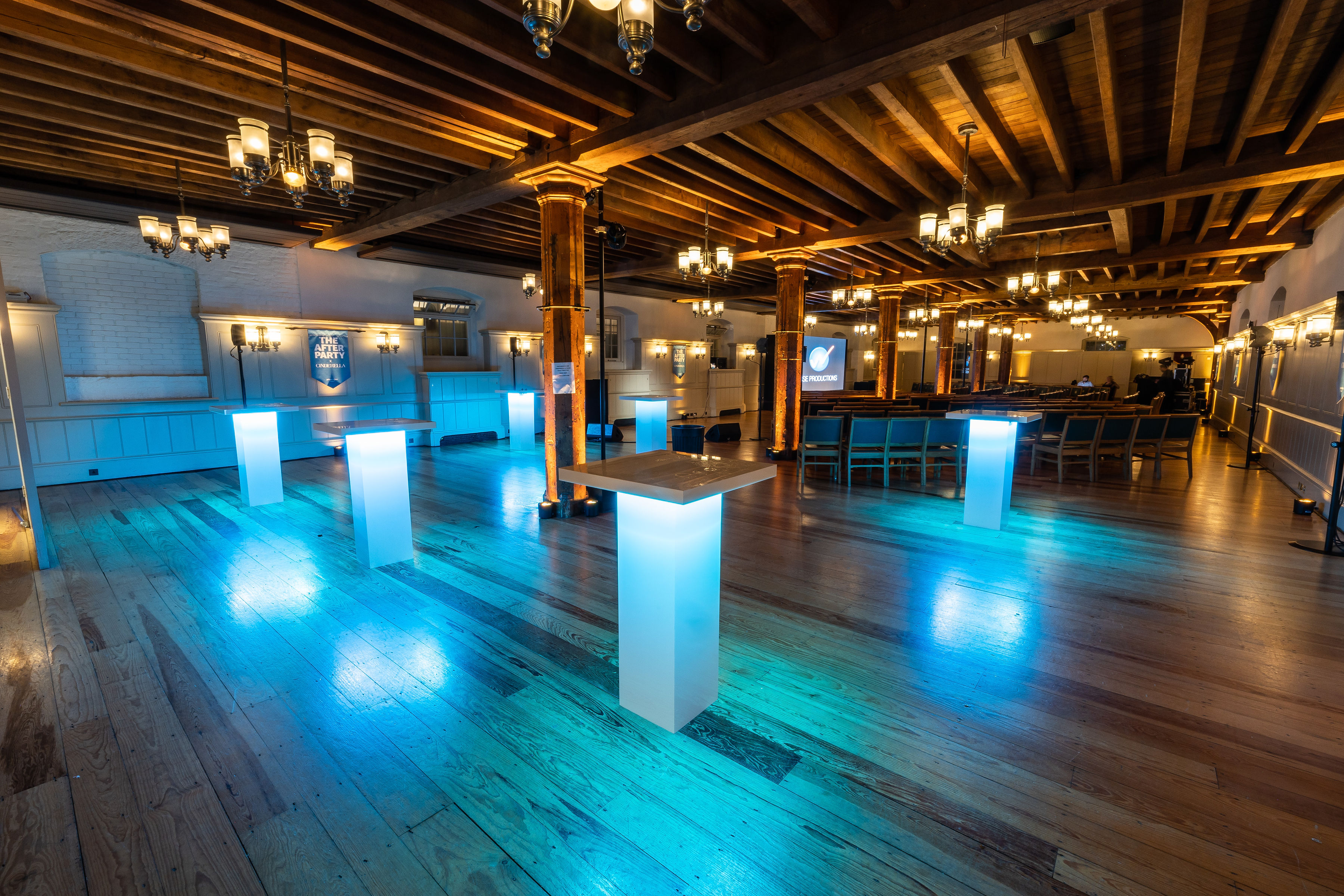 New Armouries event space at Tower of London with elegant beams, ideal for gatherings.