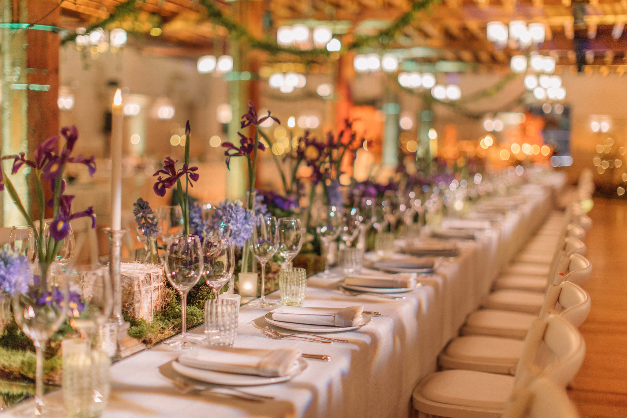 Elegant banquet table with floral arrangements at New Armouries, Tower of London event.