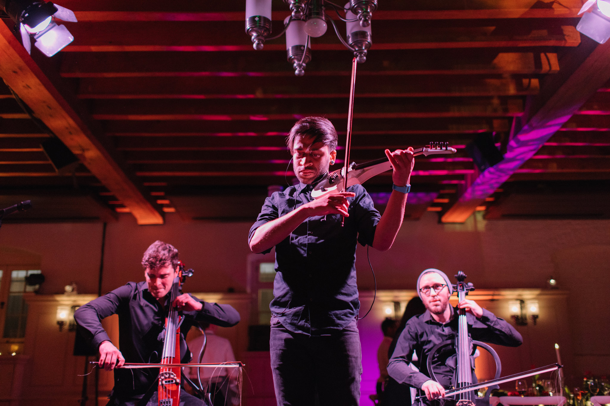 Live performance at New Armouries, Tower of London, featuring string musicians for events.