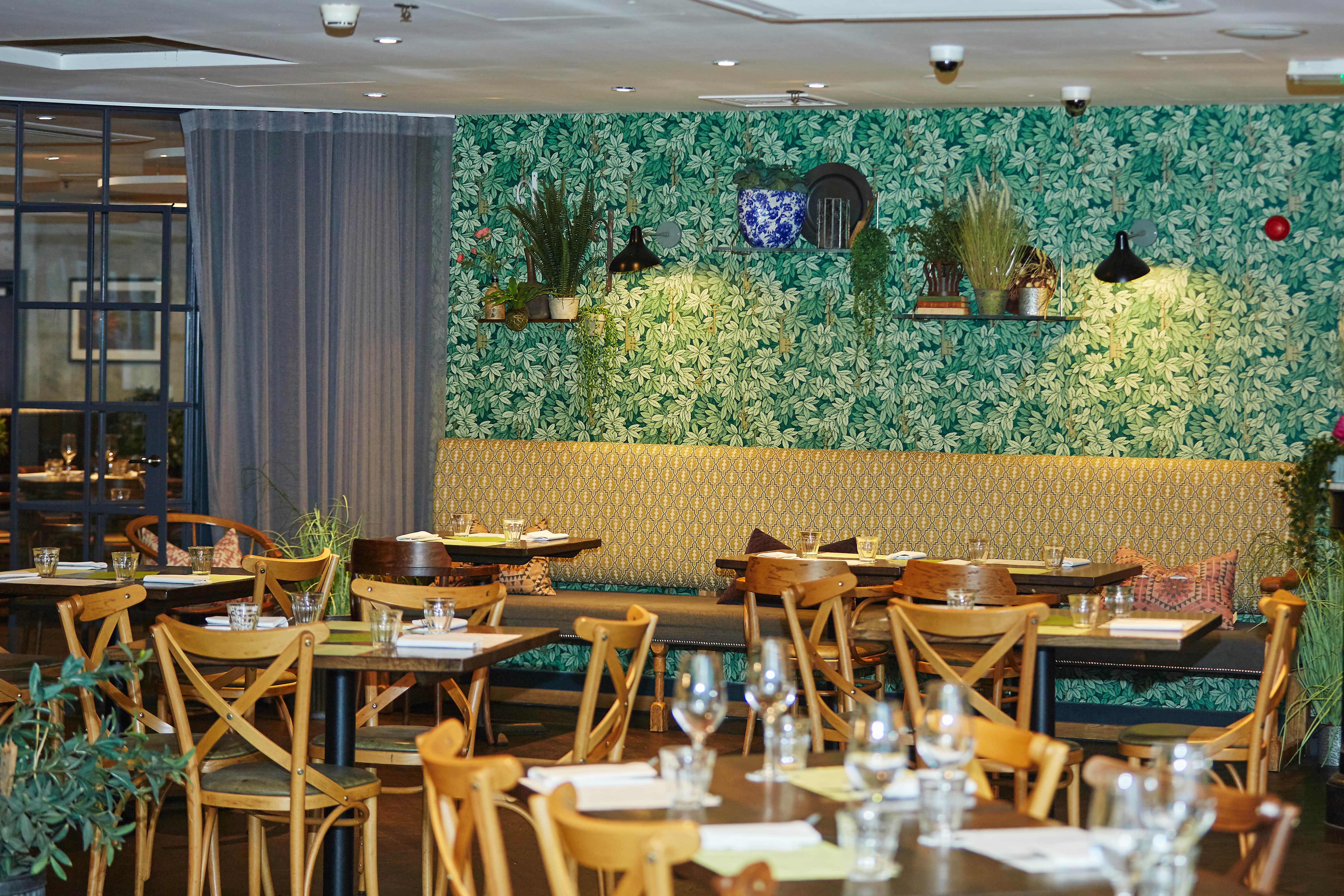 Vibrant Brasserie Blanc Southbank for intimate gatherings with floral wallpaper and natural light.