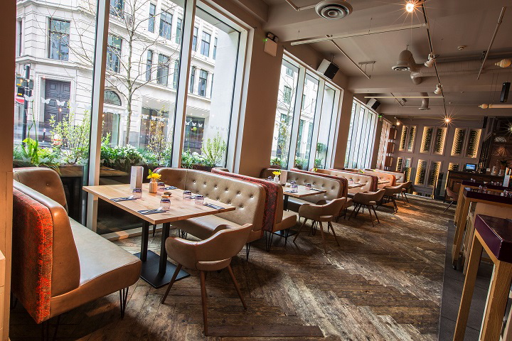 Modern restaurant window booths, ideal for meetings and social events.