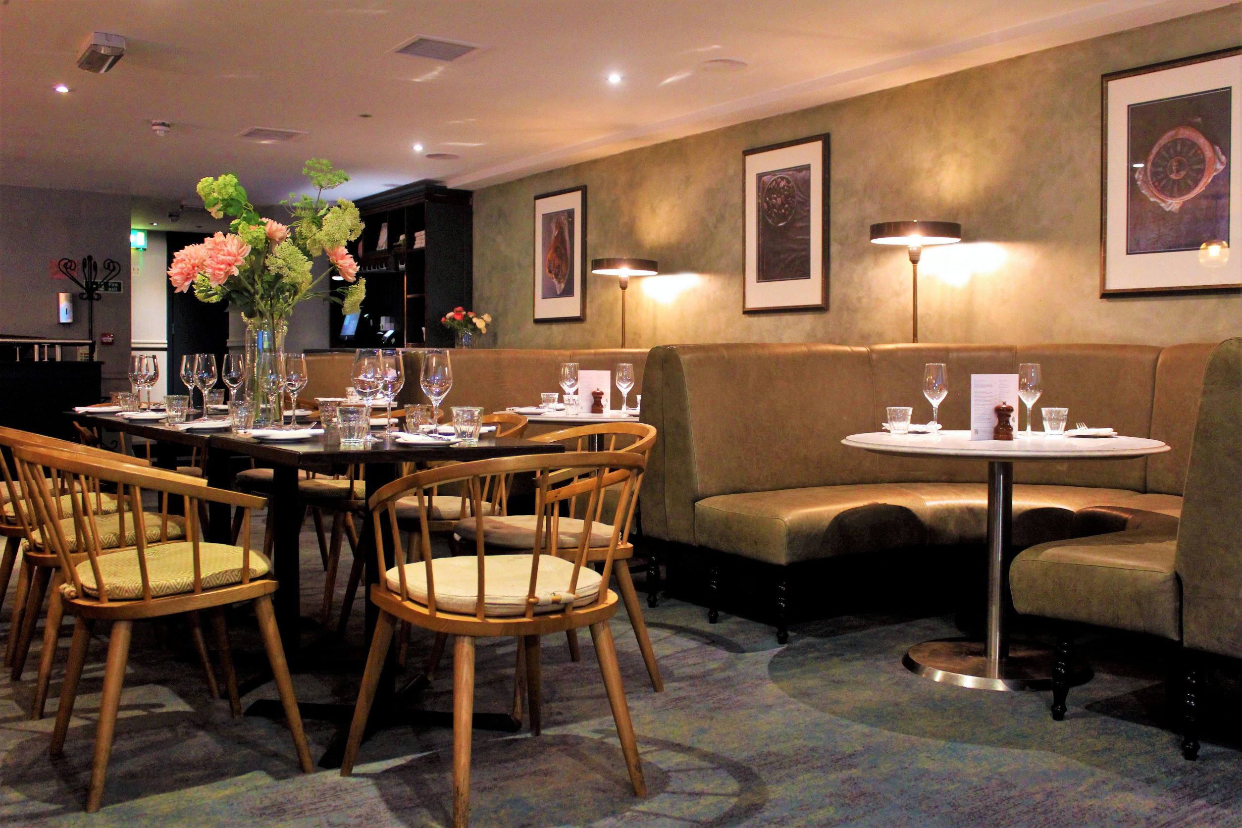 Stylish dining area at Brasserie Blanc for intimate meetings and events.