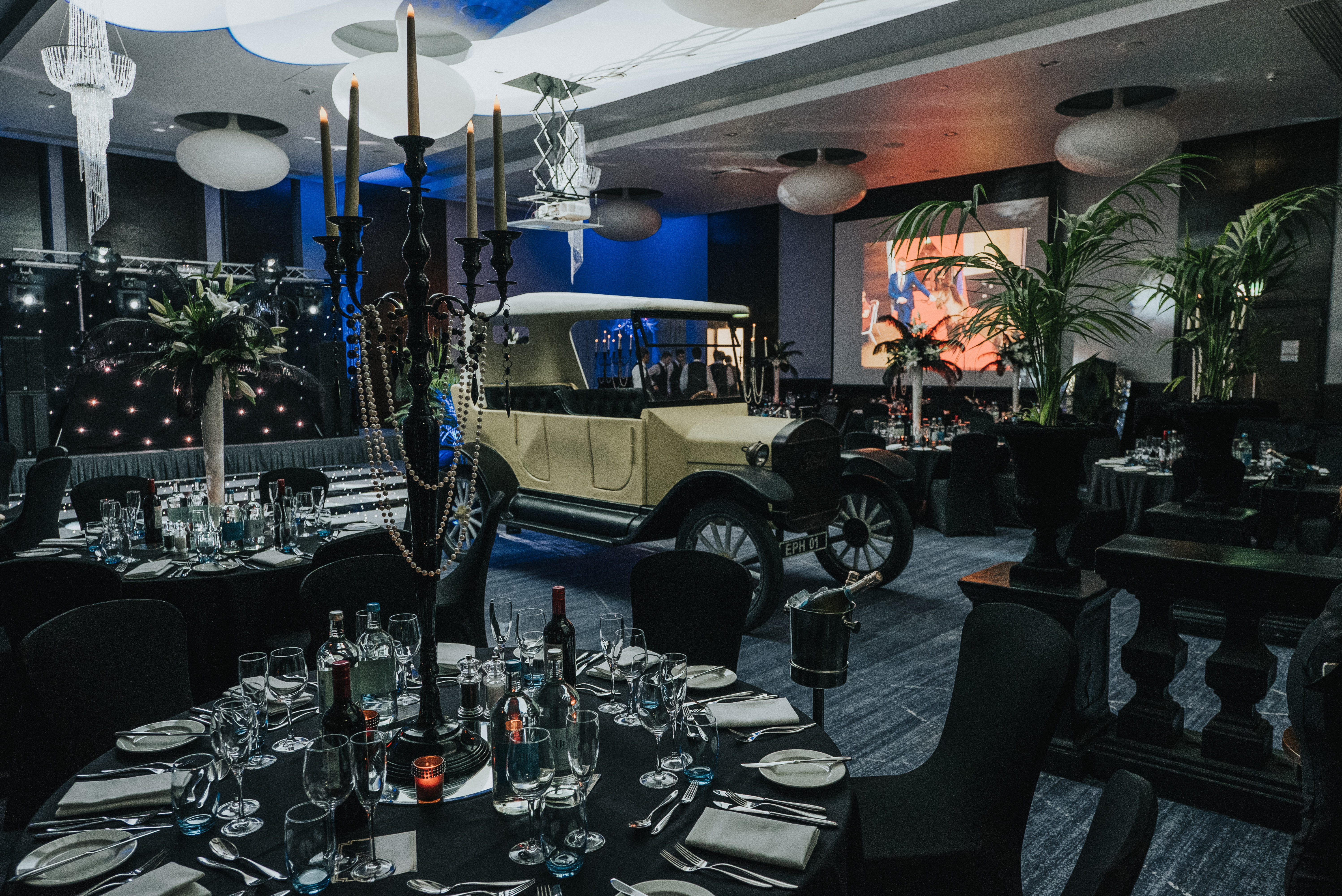 Tower Suite at Hilton London Tower Bridge with vintage car centerpiece for elegant events.