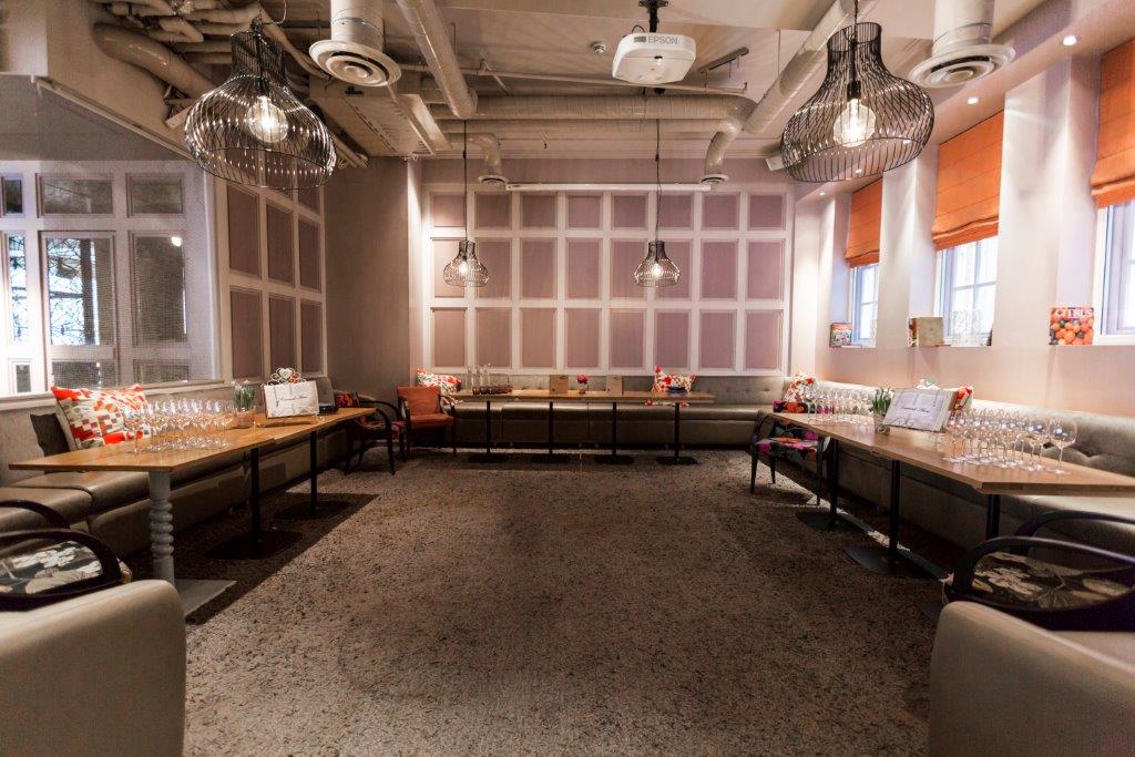 Stylish event space with comfortable seating for corporate meetings and gatherings.