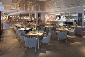 Modern restaurant interior with elegant decor for meetings and events.
