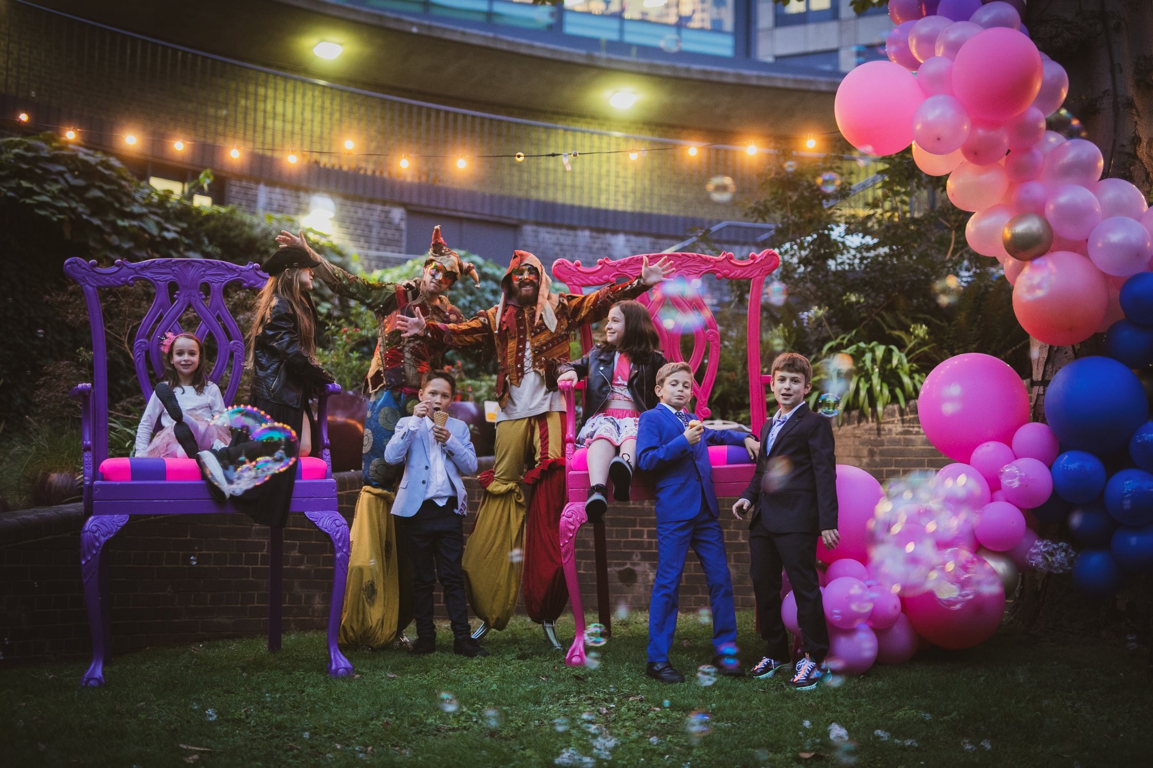 Vibrant outdoor event at Terrace Gallery, London with colorful decor and festive atmosphere.