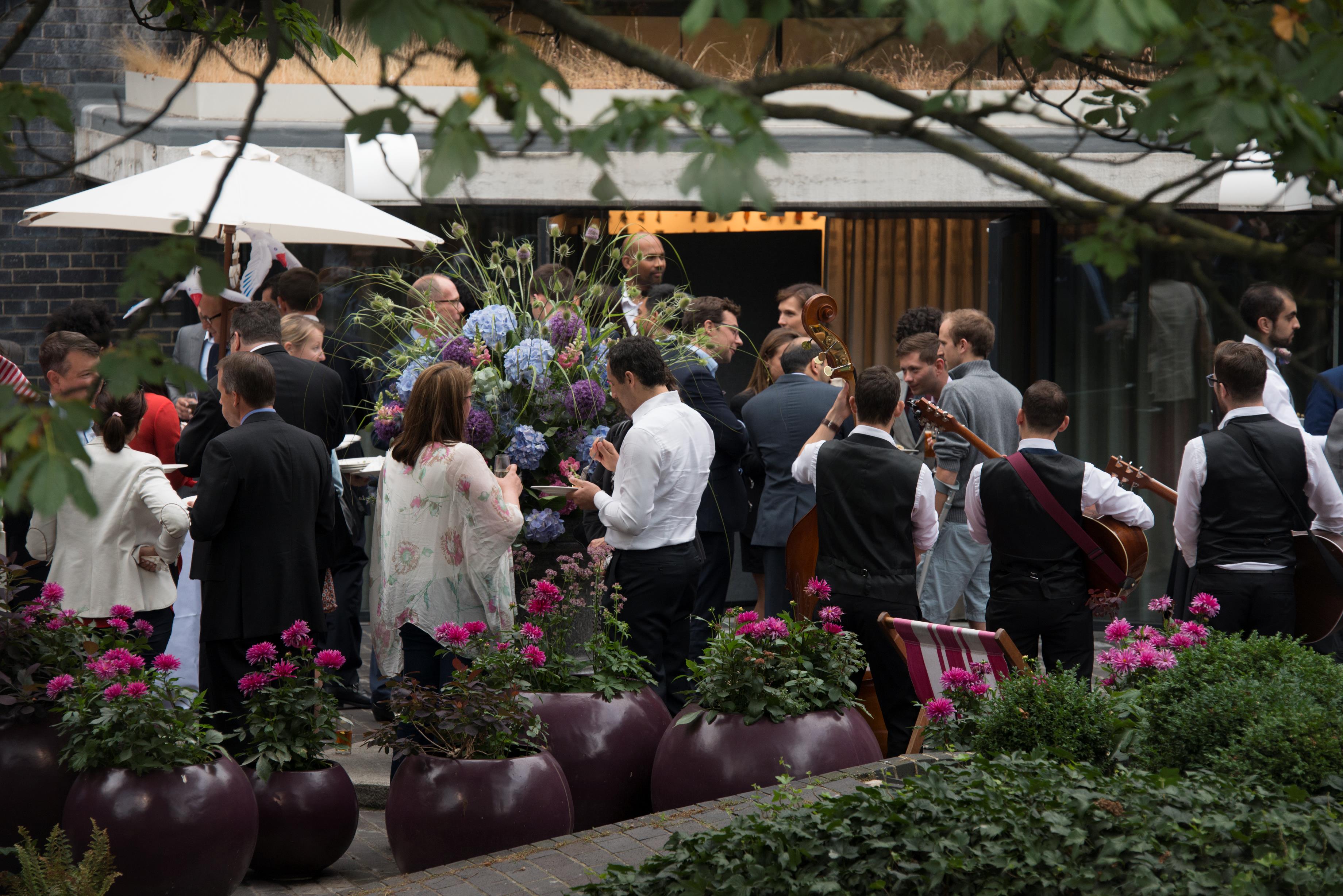 Terrace Gallery outdoor event with floral displays, ideal for corporate networking and celebrations.