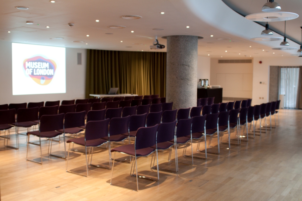 Terrace Gallery event space in London with purple chairs for conferences and presentations.