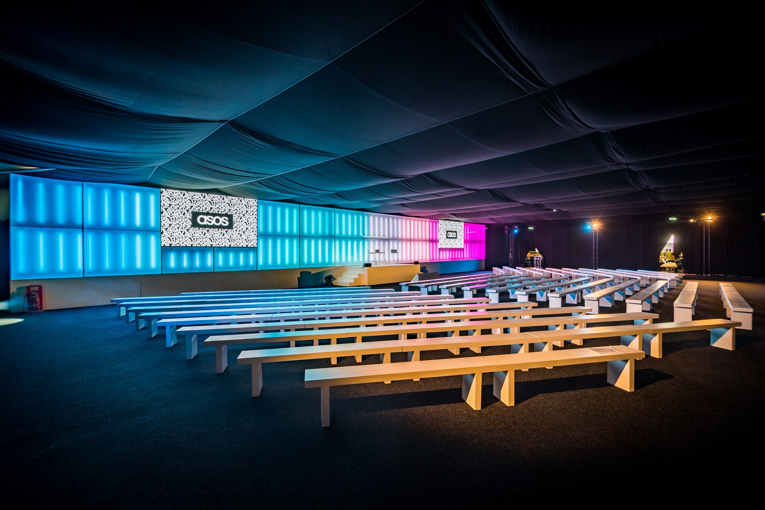 Great Hall at Alexandra Palace: modern event space with white benches for conferences.