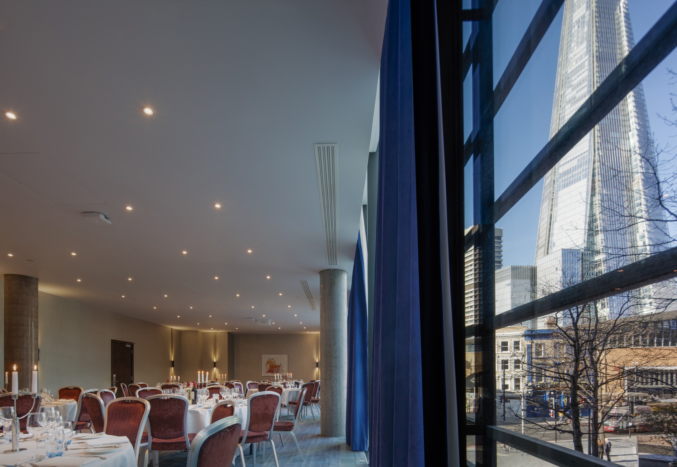 Elegant event space at Hilton London Tower Bridge with Shard view for corporate gatherings.