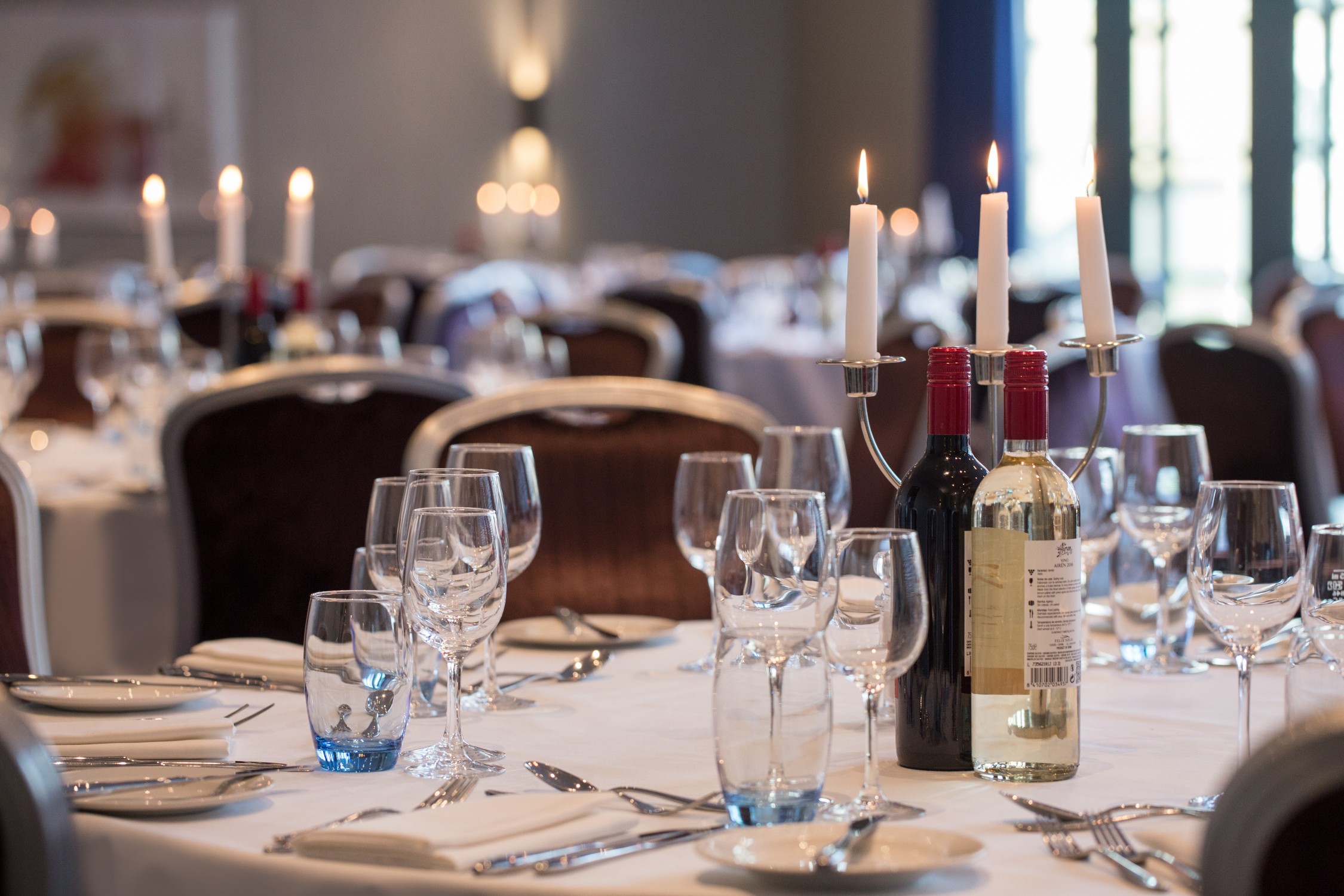 Elegant dining table setup at Hilton London Tower Bridge for formal events and galas.