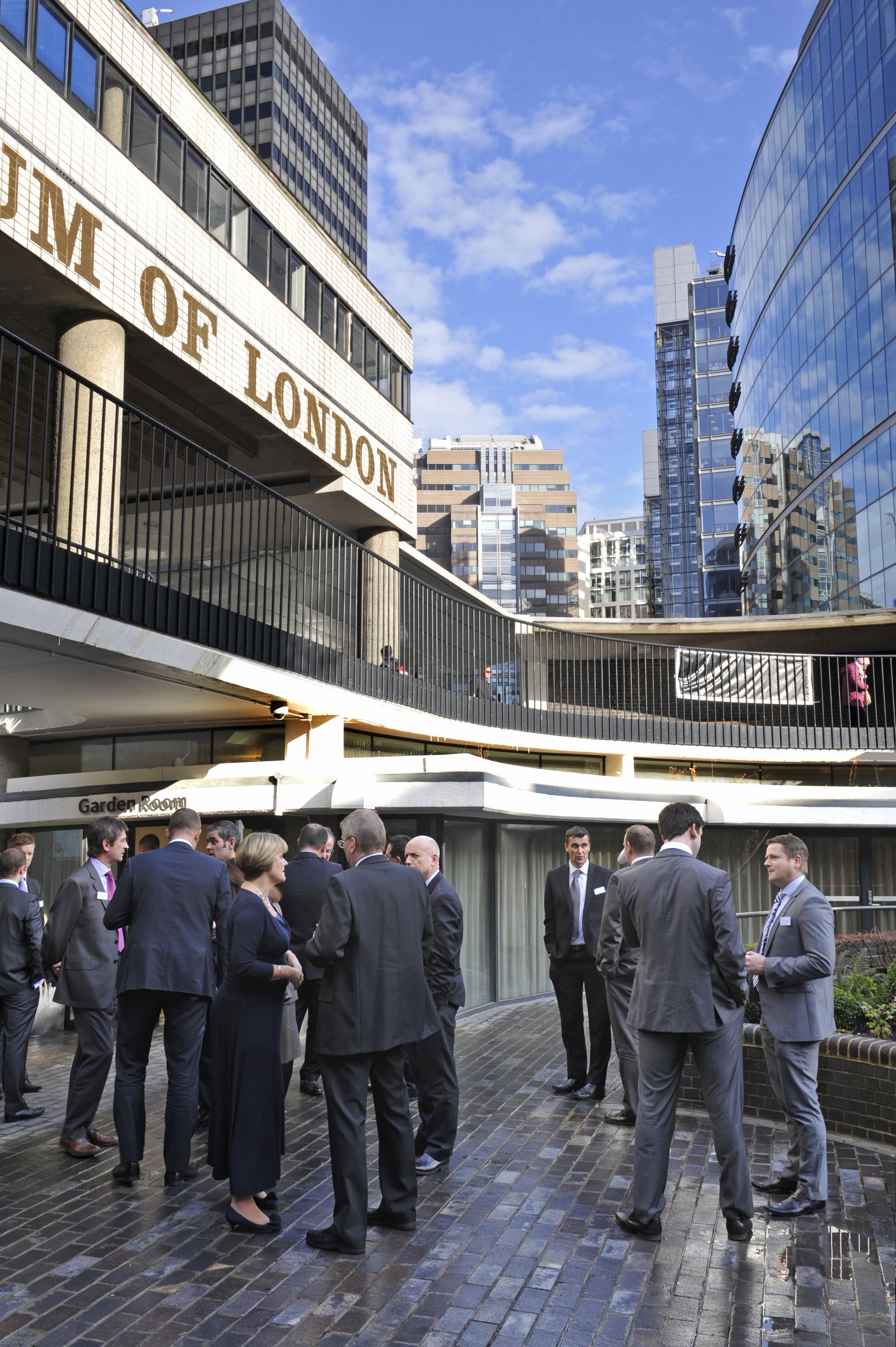 Networking event at Terrace Gallery, London; modern architecture, professional atmosphere.