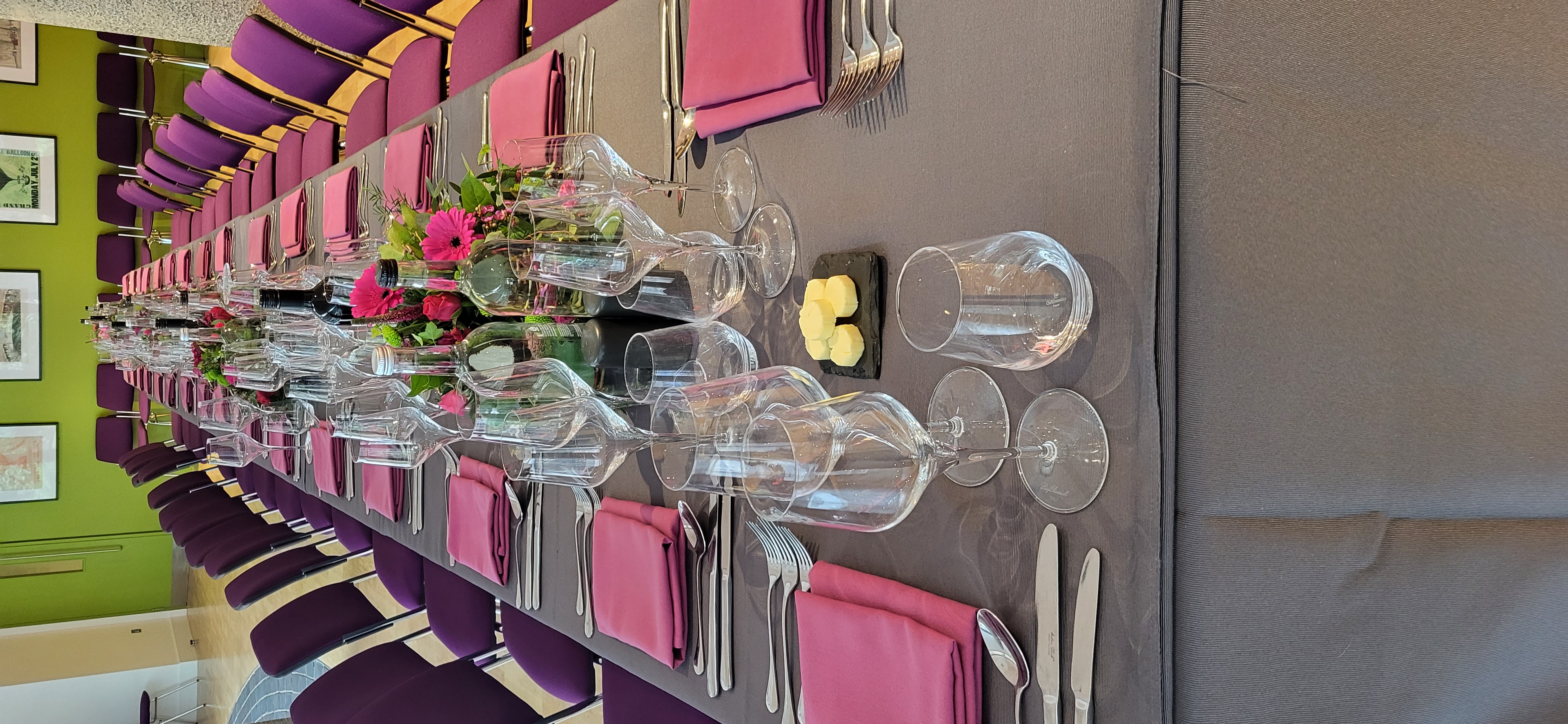 Elegant dining table with purple napkins at Terrace Gallery, London event space.