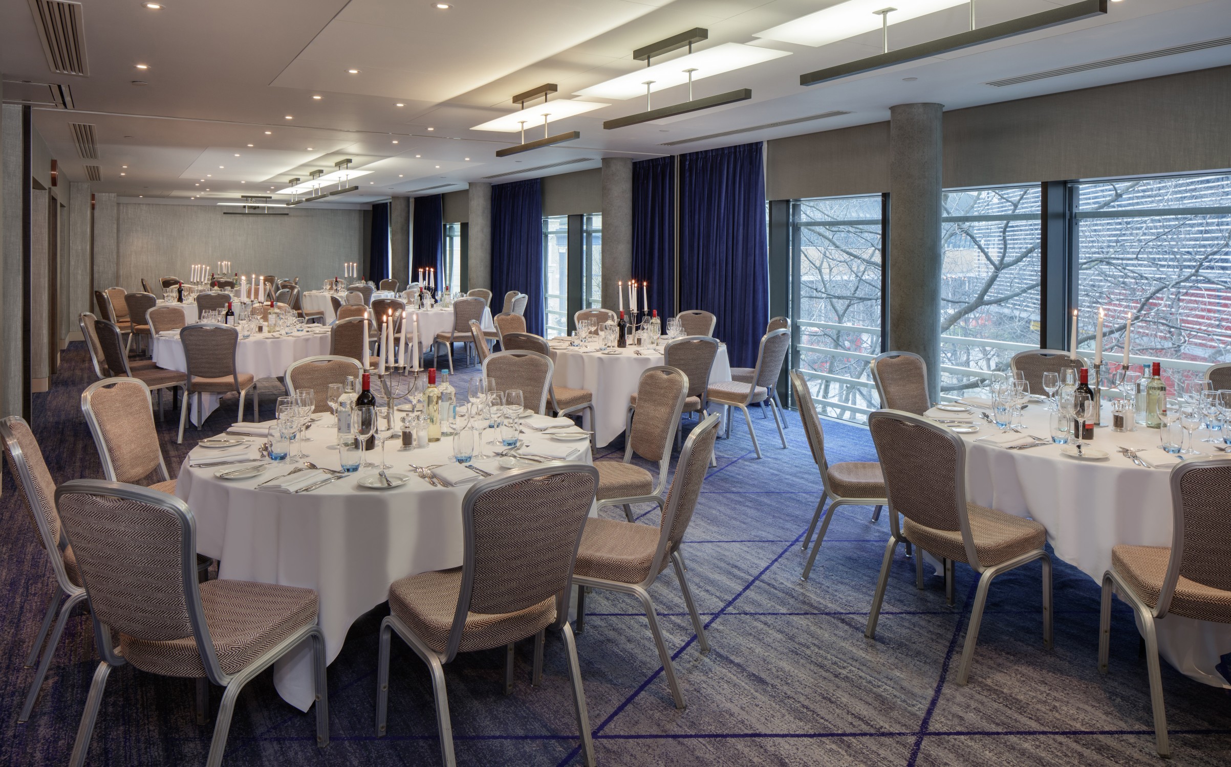 Elegant event space in Hilton London Tower Bridge, perfect for corporate dinners and celebrations.