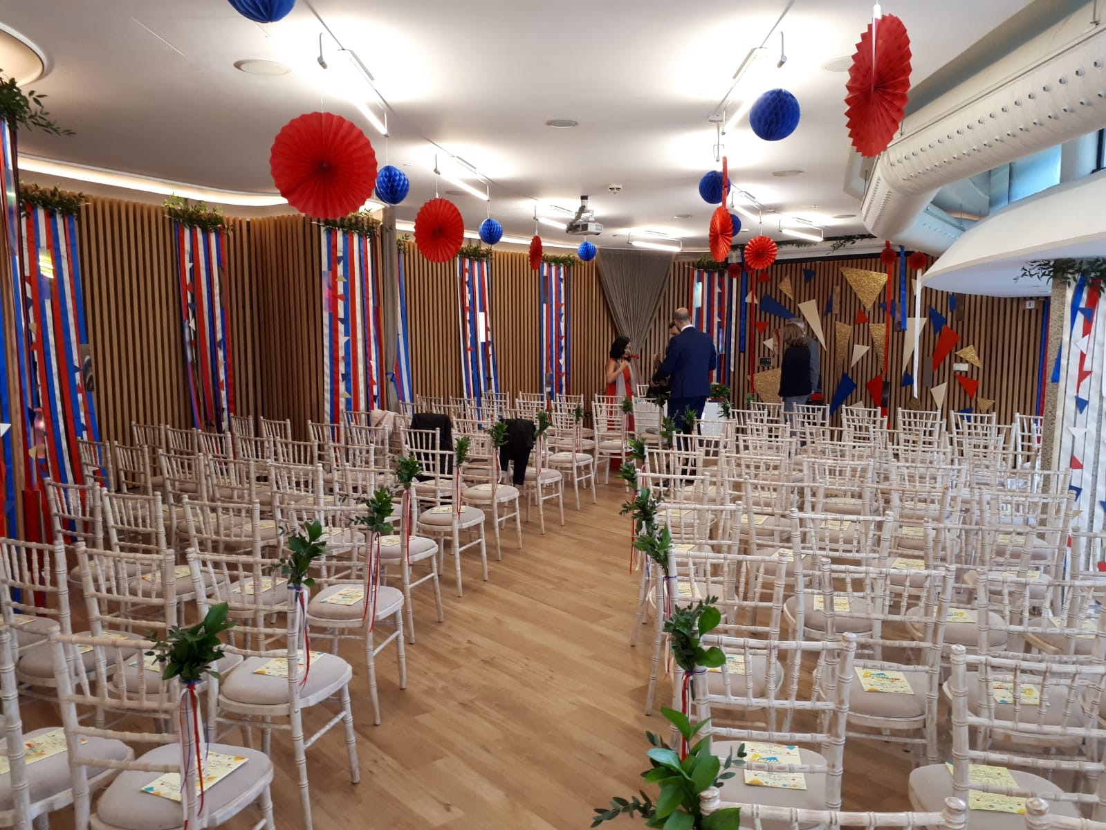 Elegant Garden Room event space in London, adorned with greenery for celebrations.