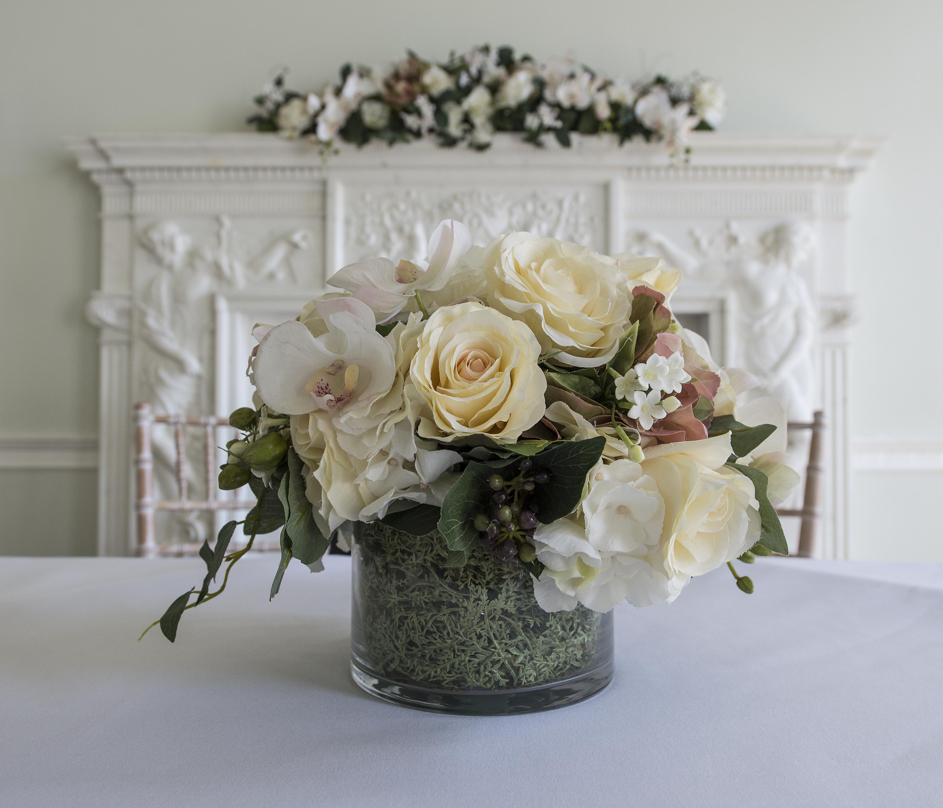 Elegant floral arrangement in Fine Room 1, perfect for weddings and upscale events.