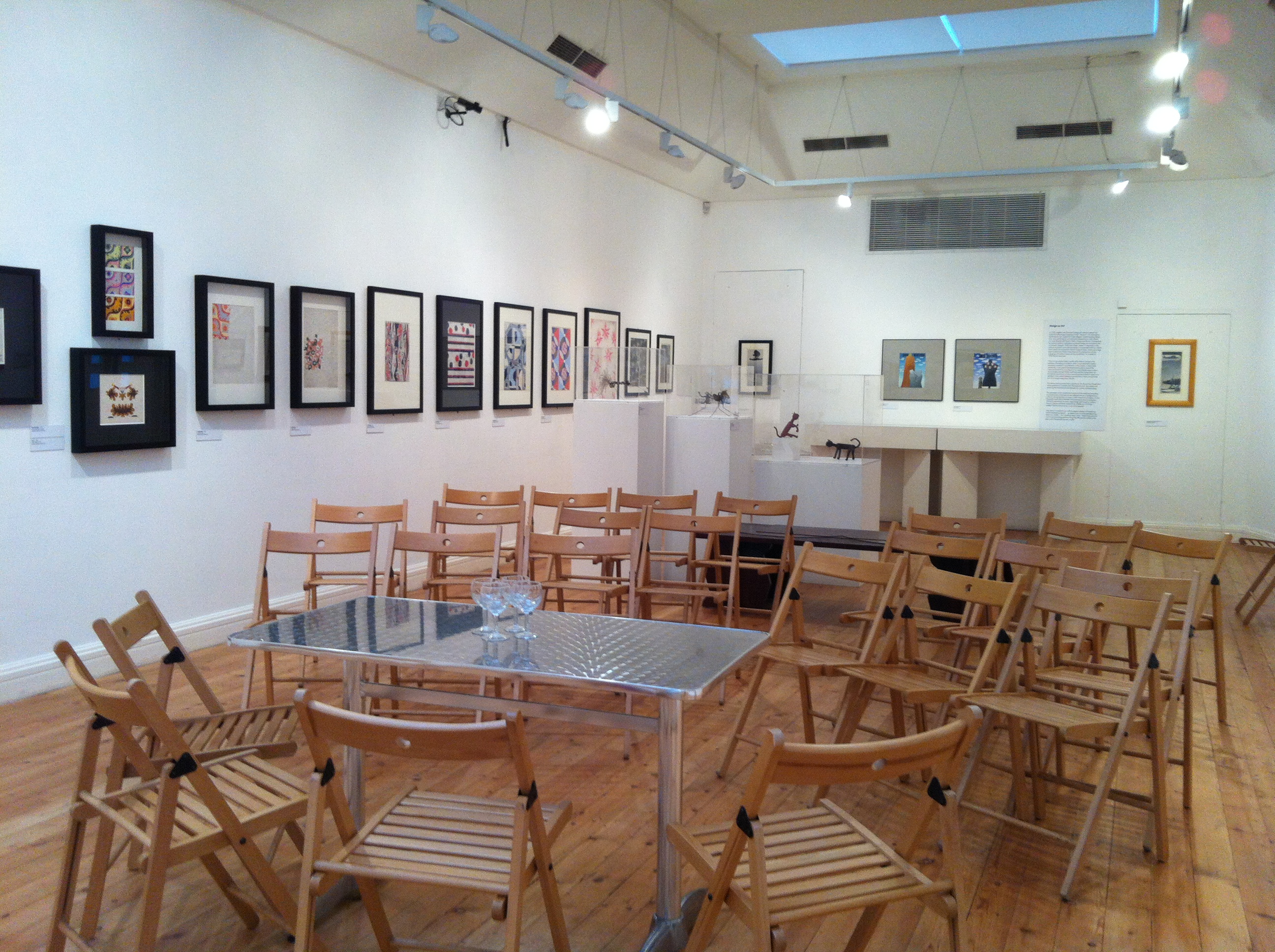 Intimate event space at Estorick Collection, minimalist design for workshops and meetings.