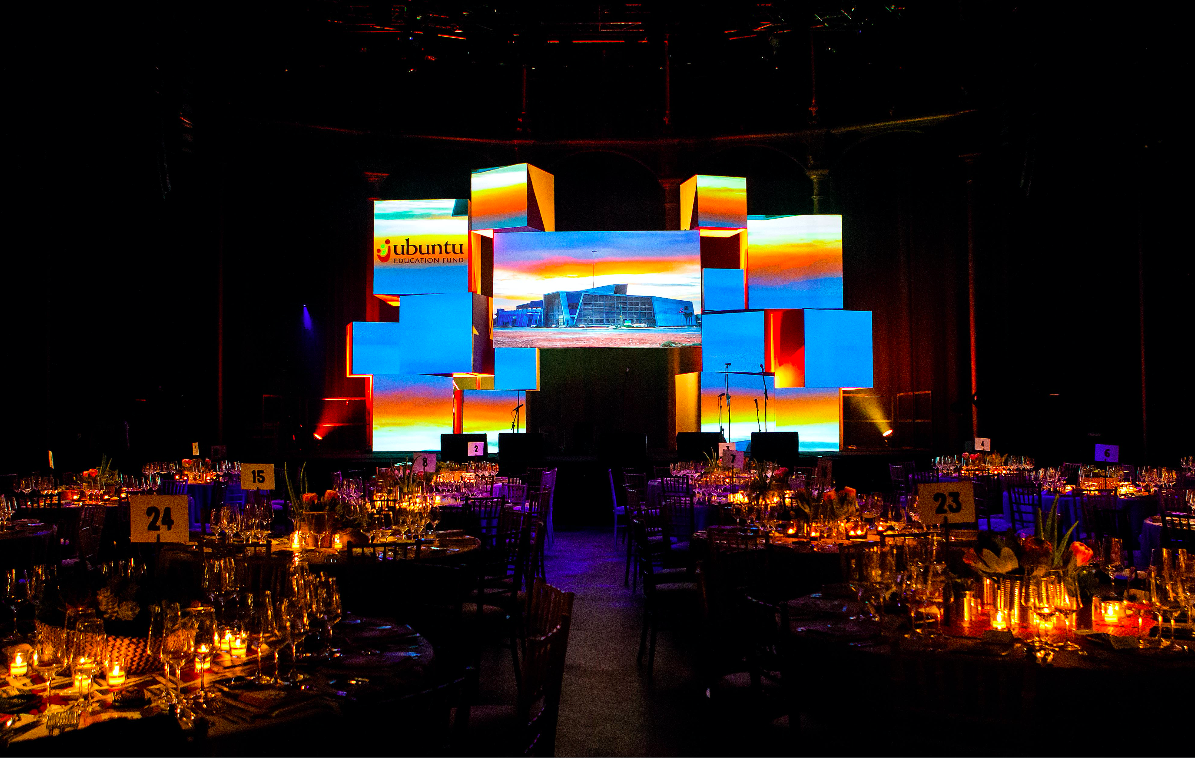 Sophisticated event setup in Roundhouse with elegant tables for a gala or awards ceremony.