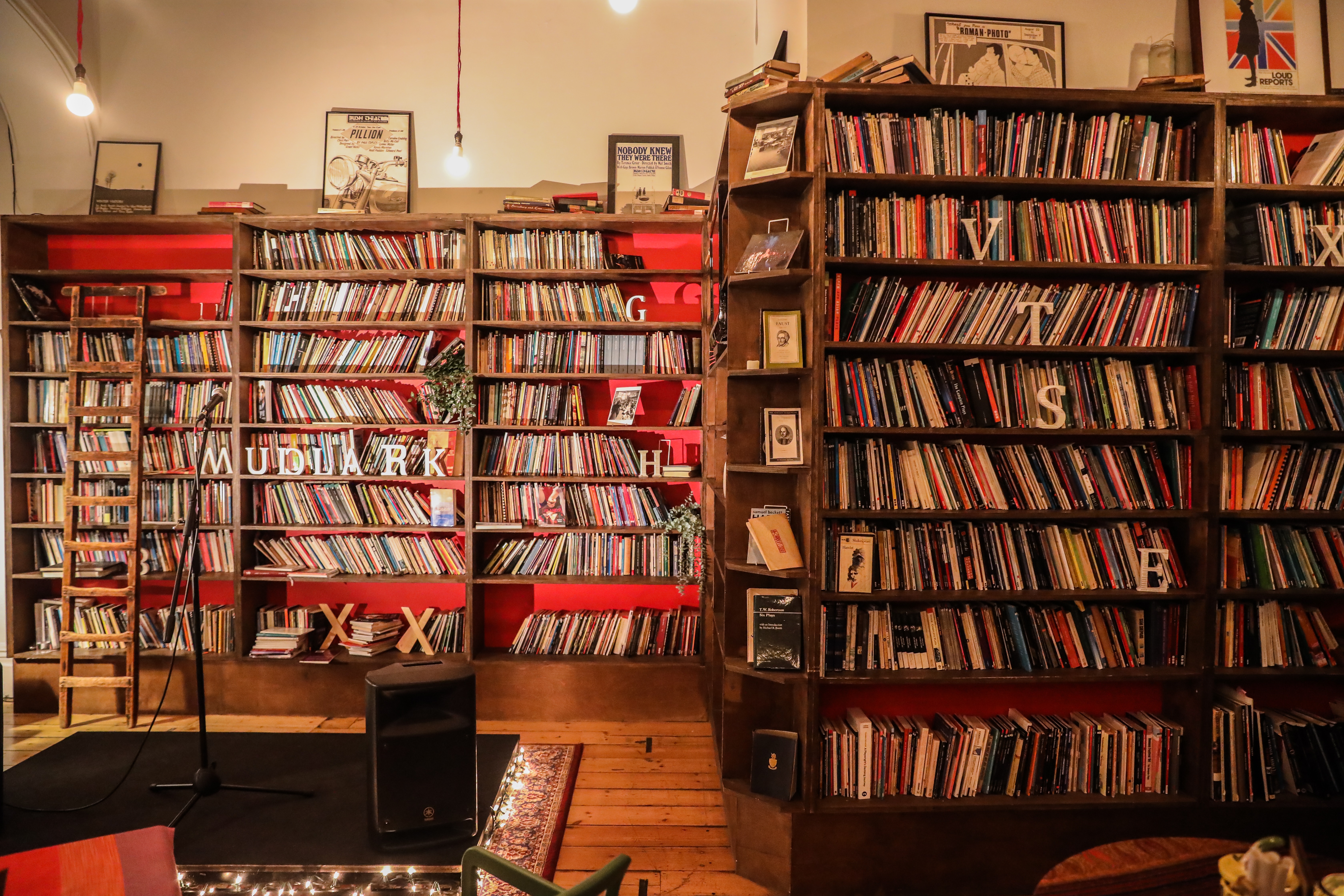 Cozy library in Bush Theatre with bookshelves, ideal for literary events and workshops.