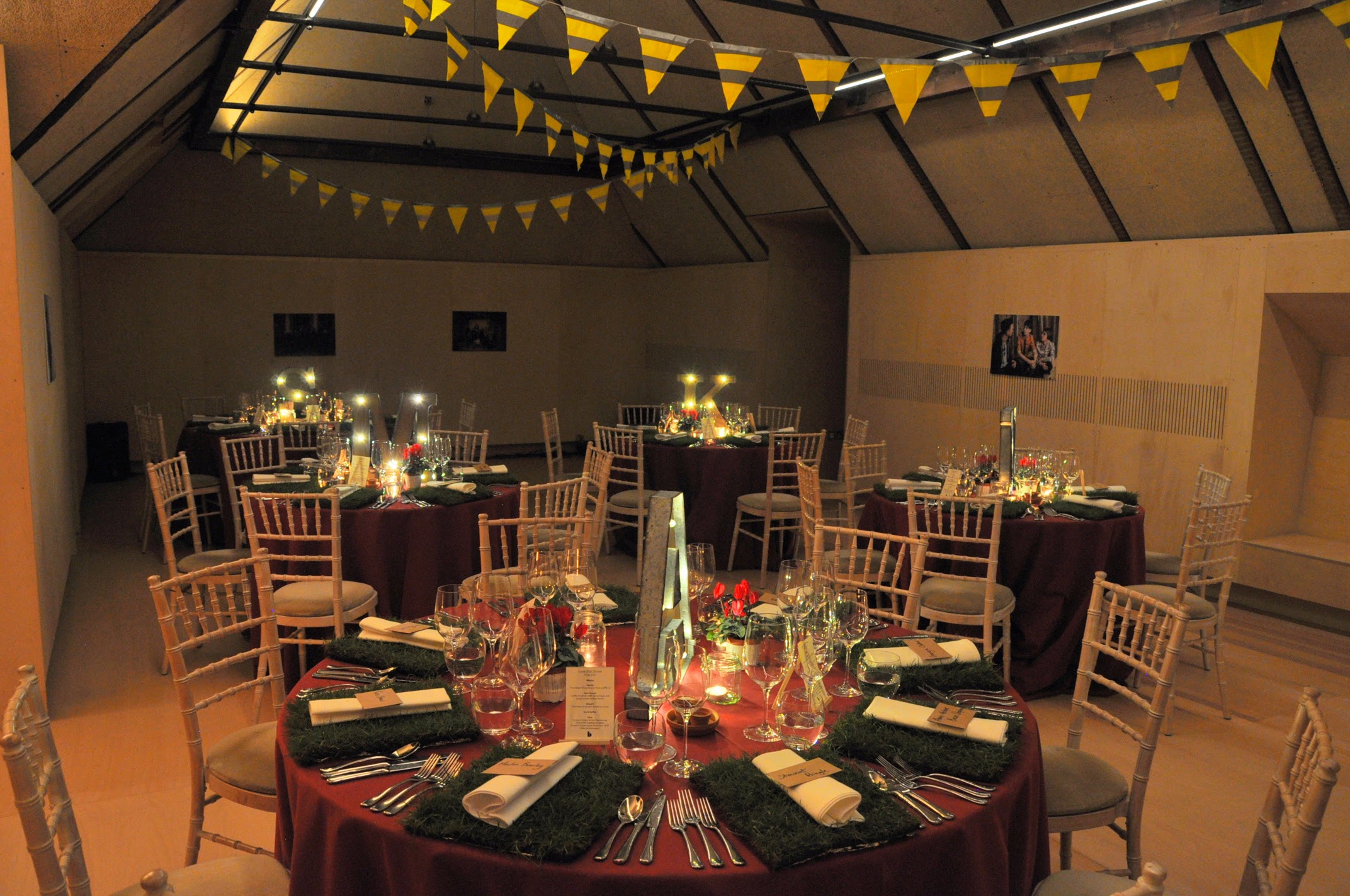 Elegant event space at Bush Theatre with round tables, perfect for weddings and parties.