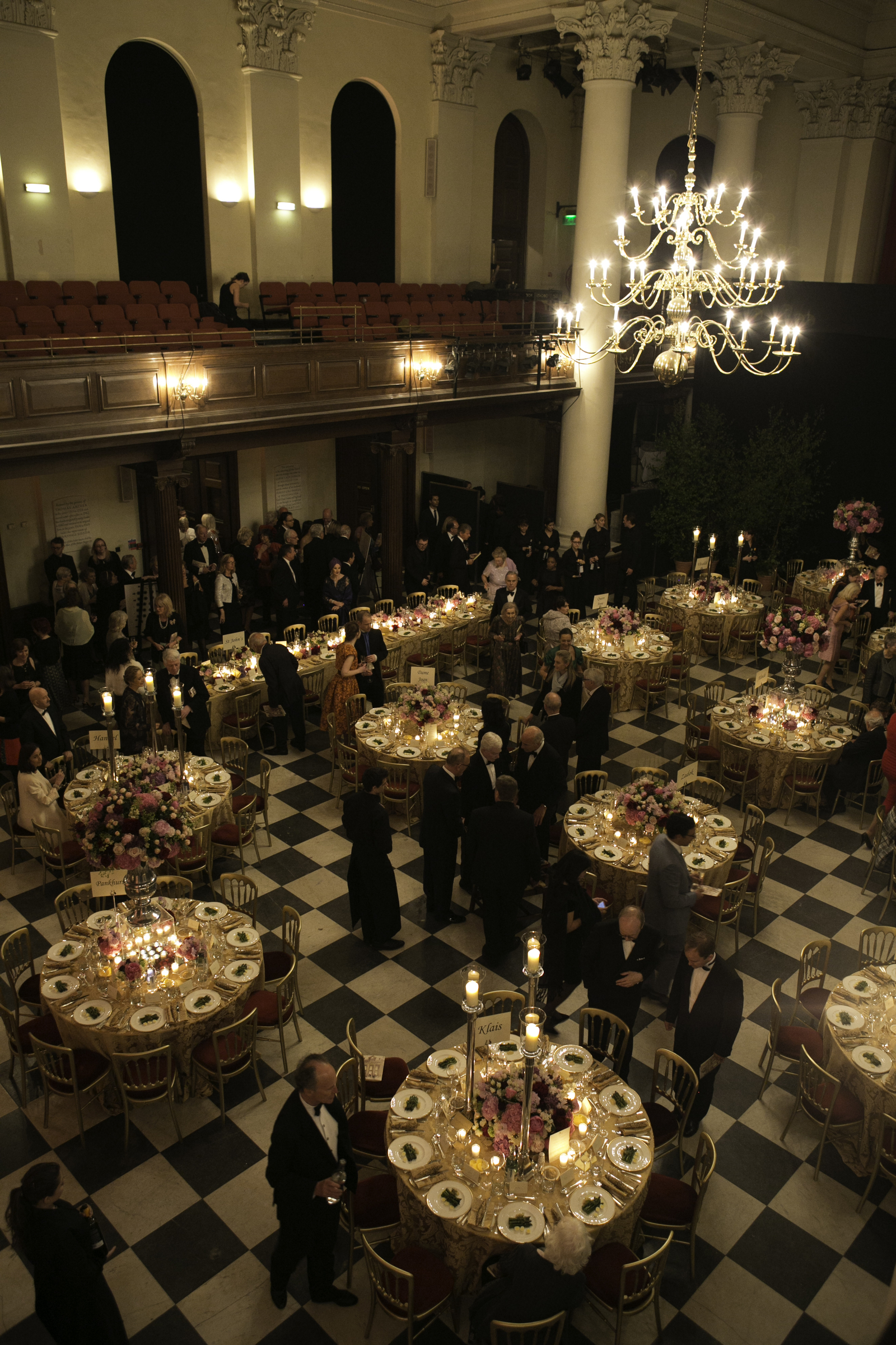 Gala event in Main Hall, Sinfonia Smith Square with elegant floral centerpieces.