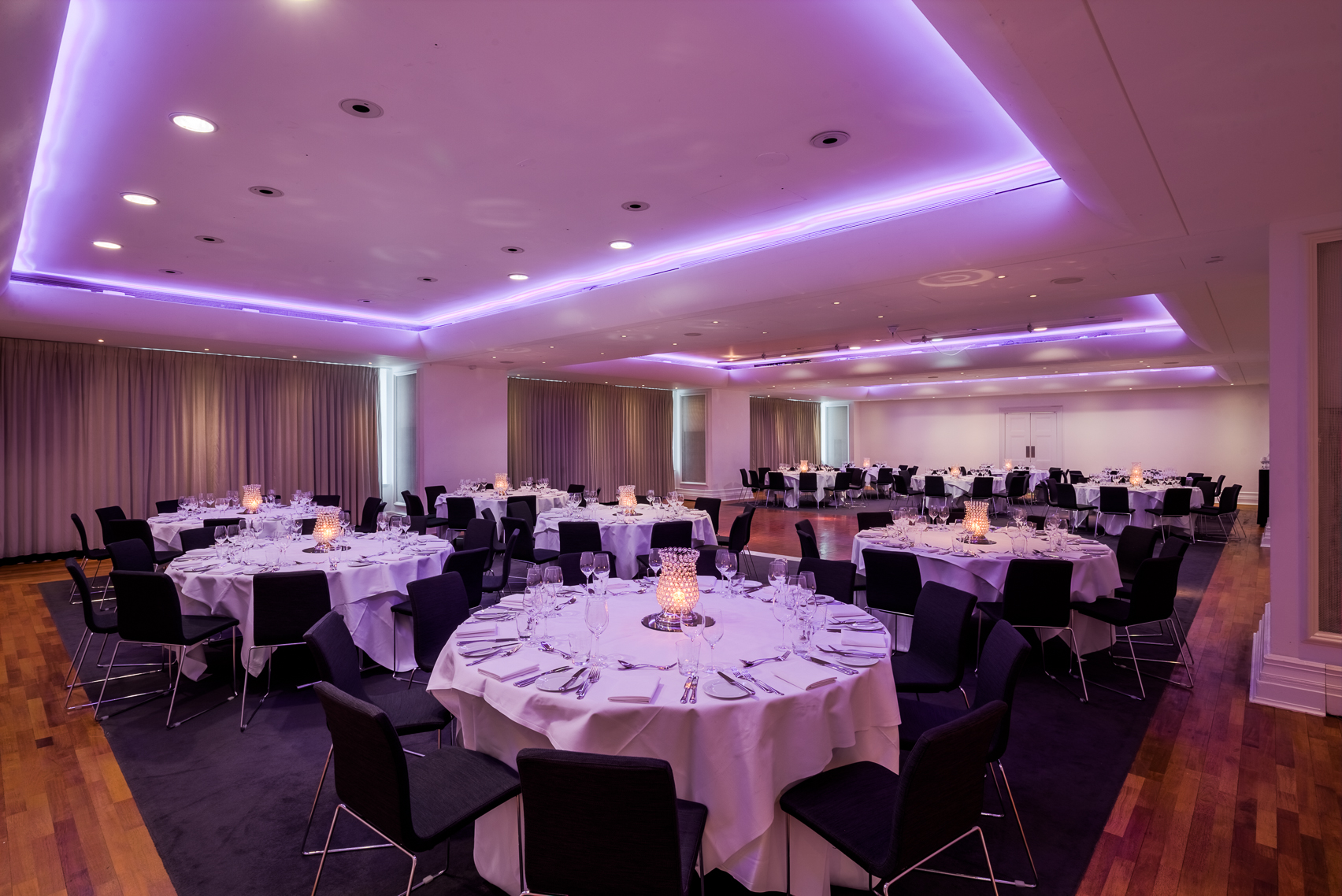 Great Eastern Suite at Andaz London, elegant dinner setup for corporate events.