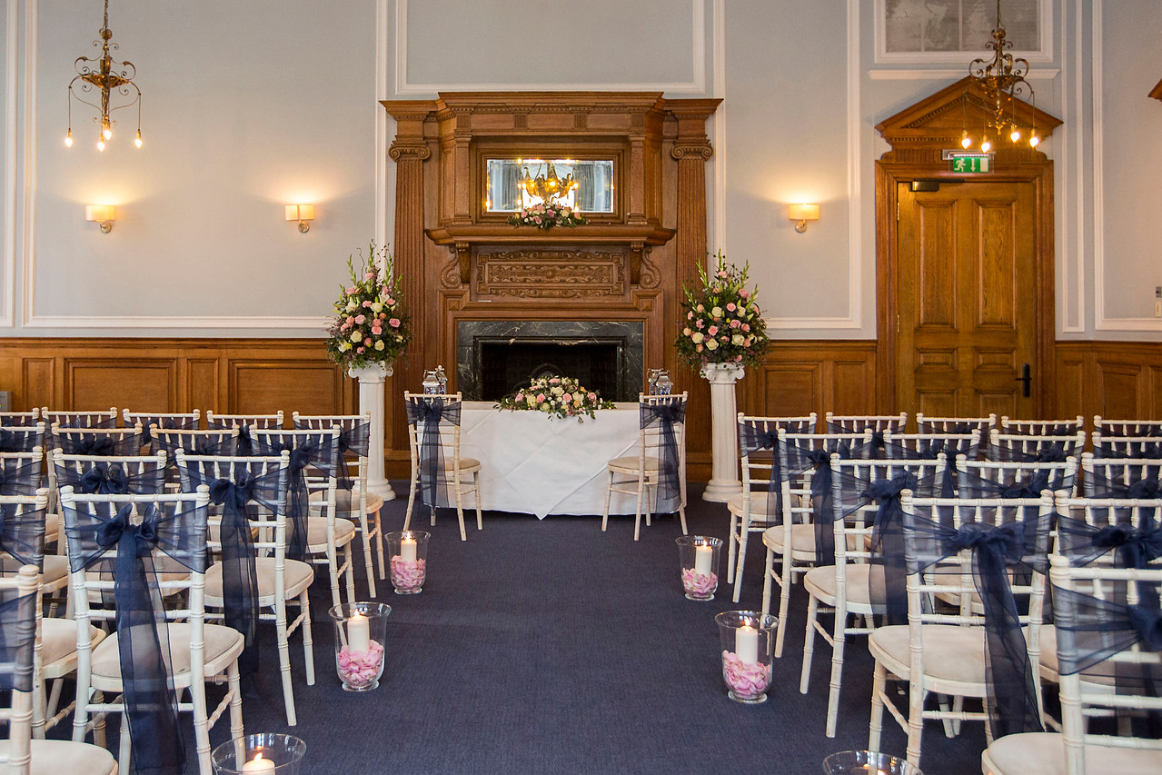 Elegant wedding venue at Andaz London with wooden features and romantic floral decor.