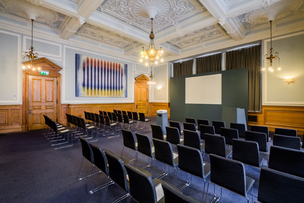 Bishopsgate meeting room with black chairs, ideal for corporate events and workshops.