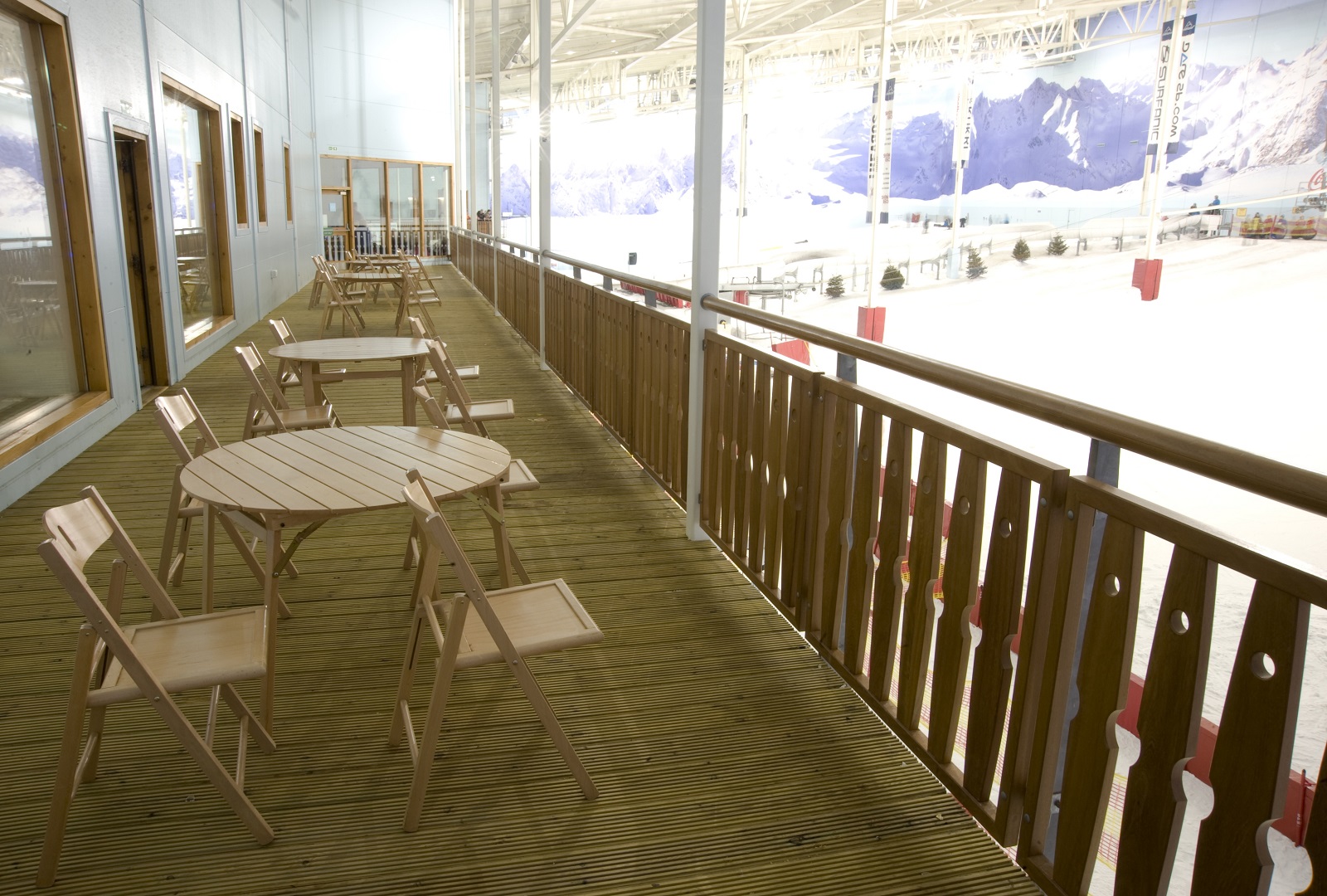 Après Lodge balcony overlooking indoor ice rink, perfect for networking events.
