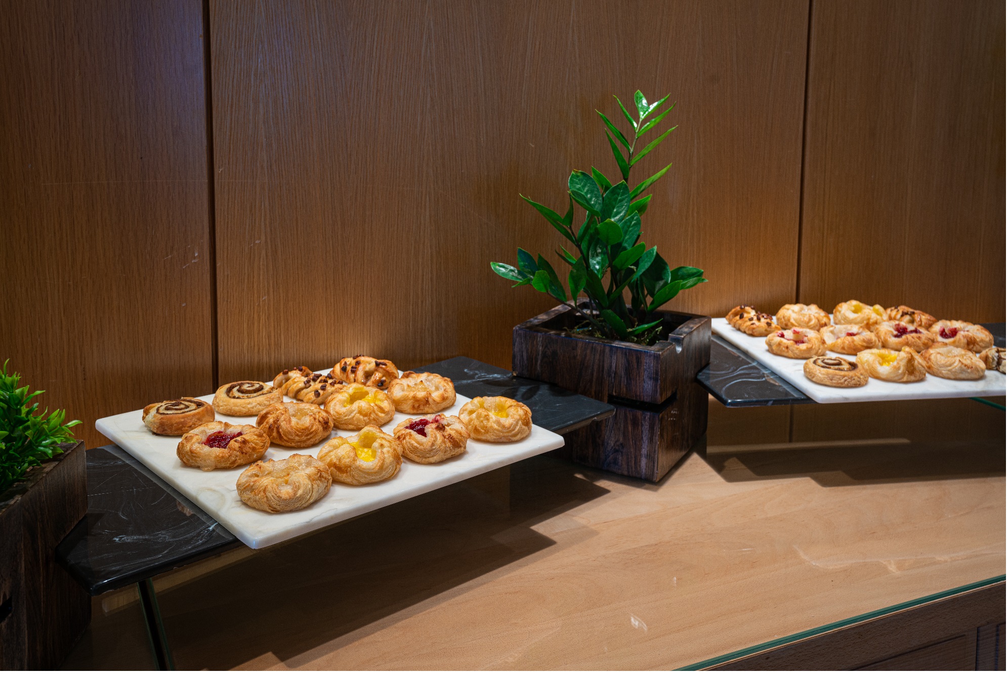 Elegant pastry display in Hilton Deansgate meeting rooms for networking events.