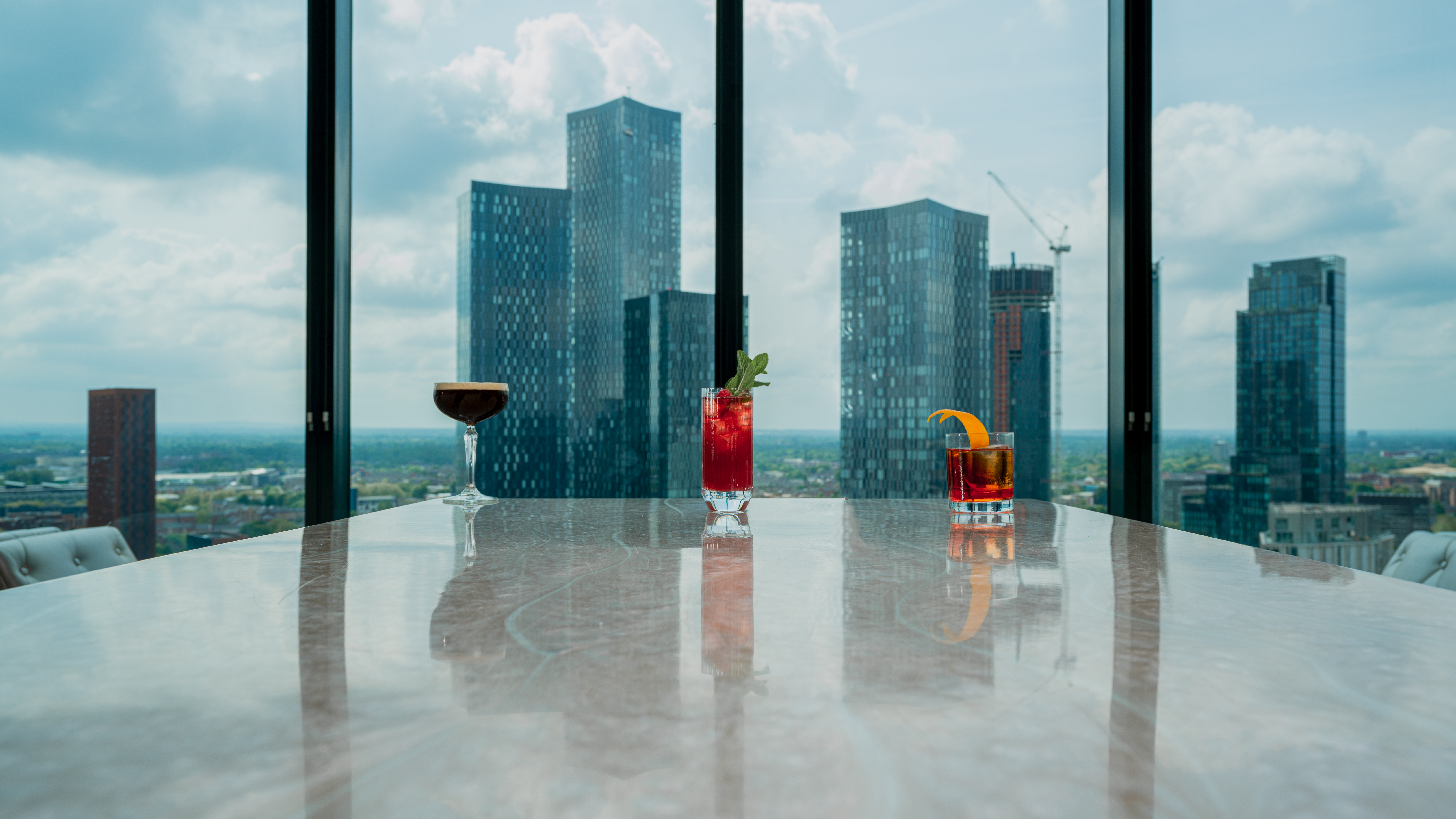 "Cloud 23 event space with skyline view, perfect for corporate cocktail receptions."