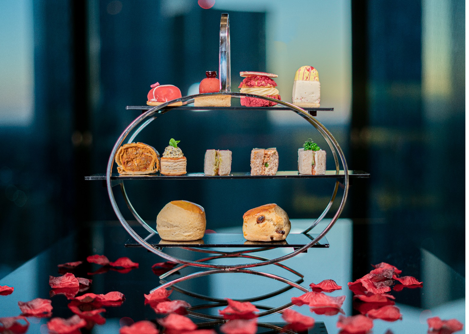 Elegant tiered pastry display for high-end afternoon tea at Hilton Deansgate.