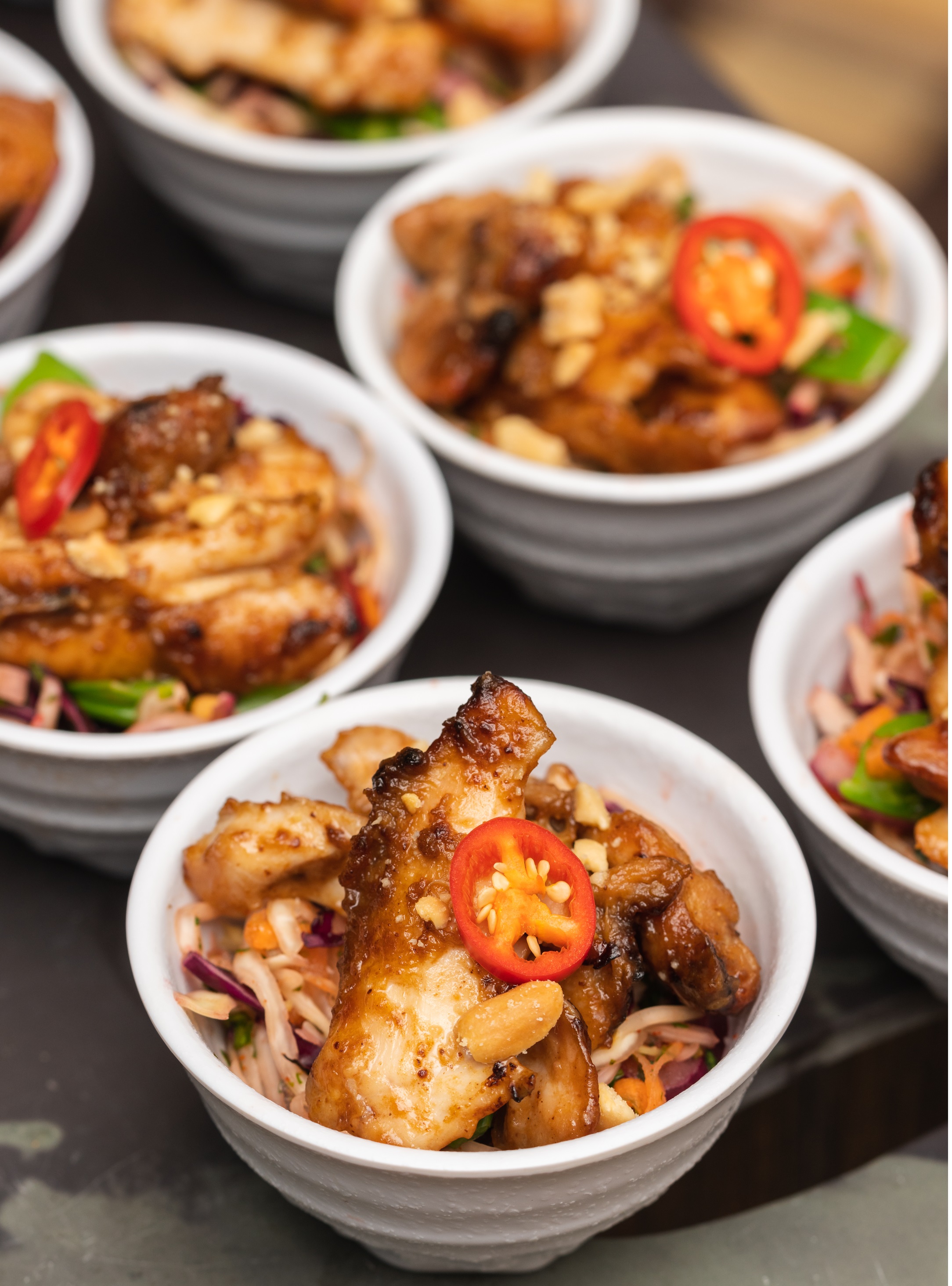 Elegant small bowls of vibrant dishes at Cloud 23, perfect for networking events.