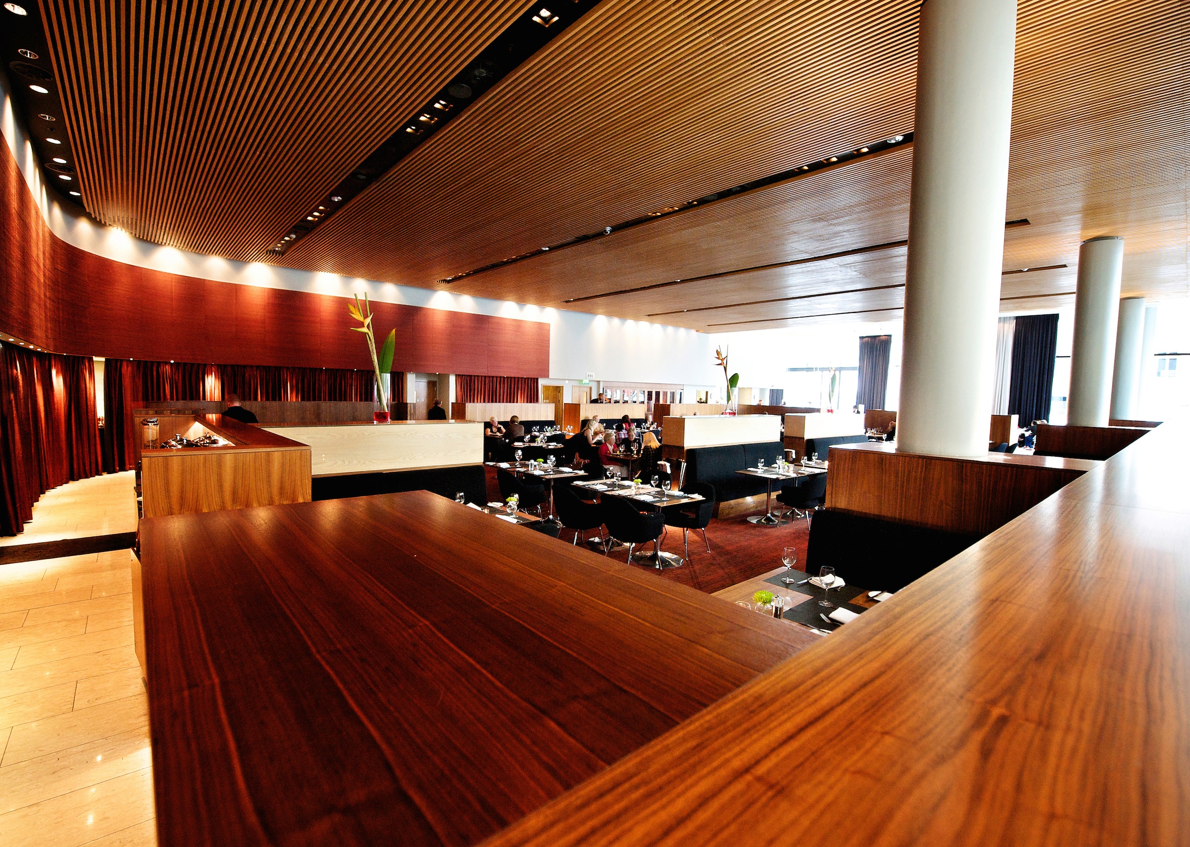 Podium Restaurant & Bar Lounge: modern dining space for corporate events and private gatherings.