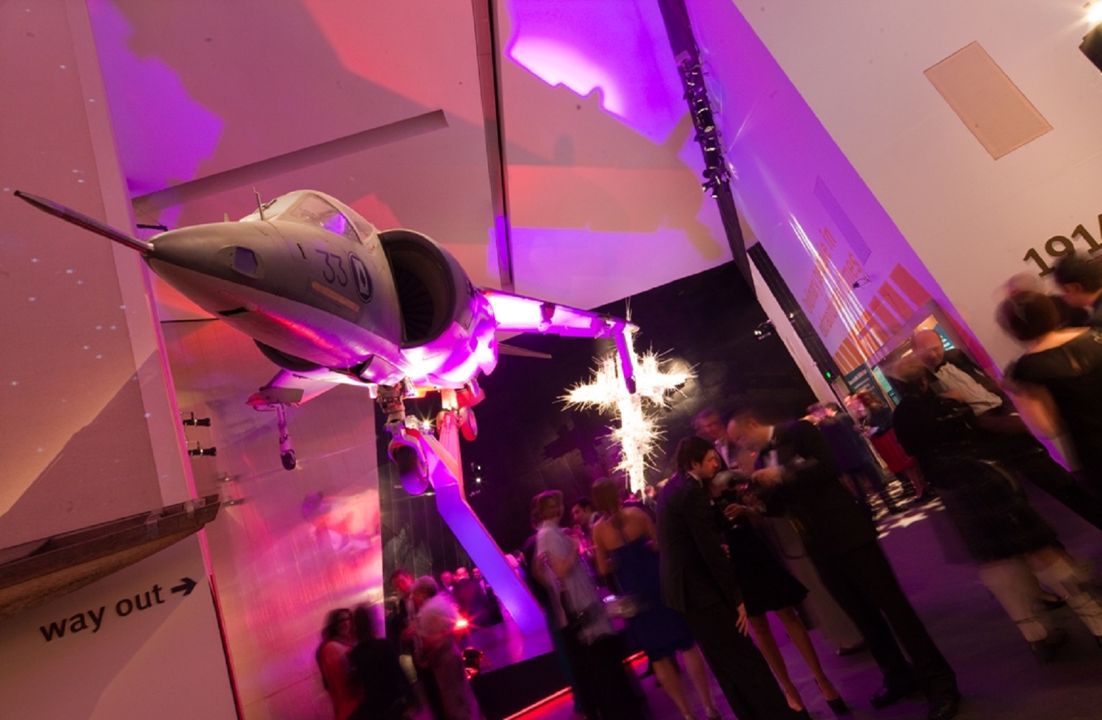 Harrier Jump Jet installation at Imperial War Museum North, vibrant event space for networking.